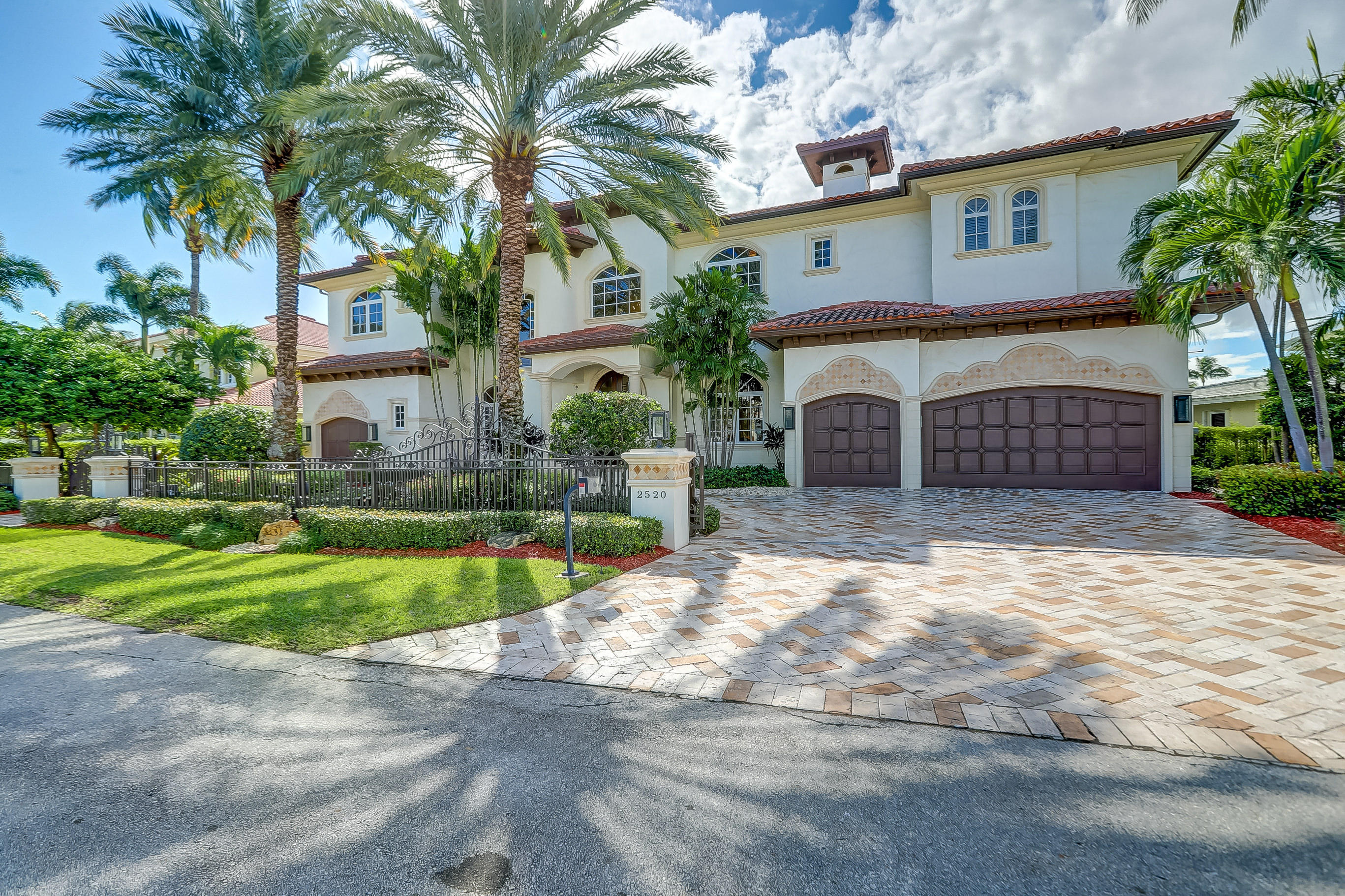 This Elegant Gated Estate Home located on one of Lighthouse Points most prestigious ''Island'' Streets boasts a gracious 6823 sq.ft. under air, with 6 Bedrooms, 7.5 Bathrooms, 4 Car Garage.  Expansive Water Views of the Wide Canal from almost every room! Enjoy the oversized south facing patios and balconies, a Luxury Heated Pool with large sun shelf and a jetted spa, outdoor kitchen with dining area and plenty of room for lounging.  Just a few minutes to the Hillsboro Inlet by boat, this home has an 82' Deep Water Dock, a 30,000 lb, SE Custom Boat Lift, including a commercial ice maker, perfect for the serious fisherman.  This estate home is perfect for a family and for entertaining. new quartz countertops, also has top of the line Sub Zero and Thermador appliances.  There is large poolside Club Room with billiard table and built-in bar. Upstairs you will even find an oversized Media Room for watching sports or movie nights.  This home has 6 spacious Bedrooms with En-Suite Bathrooms and large closets.  The large Master Suite has a private Sitting Room, Balcony, private Coffee Bar, his & her closets, huge Bathroom with his and her vanities, and his and her water closets, spa shower and soaking tub.  Paneled elevator, security system, fireplace, laundry rooms on each floor, central vacuum, outdoor kitchen with sunny southern exposure, Rain Soft water softener, and too many other amenities to mention.  This estate home was only occasionally used as the current owner's personal "Vacation" home (never rented) and is in immaculate "like new" condition!  A MUST SEE.  
Ideally positioned between Fort Lauderdale and Boca Raton, Lighthouse Point gives you the best of all Worlds.  Reside in a quiet, friendly, small town community but have access to city life and convenience to airports when you need.  If you desire coastal style resort living, enjoy yachting or fishing this is the home for you!