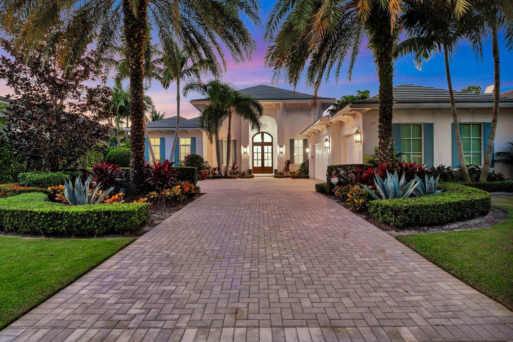 Welcome to this exceptional golf course home on prestigious Plantation Way in the renowned Old Palm Golf Club. This 4 bed, 4.2 bath residence has a NEW ROOF &  A GENERATOR and a thoughtfully designed living space, perfectly blending luxury, comfort, and functionality. 

Step inside to discover a bright and airy great room, filled with natural light and ideal for both relaxing and entertaining. The spacious kitchen is a chef's dream, featuring top-of-the-line appliances, custom cabinetry, whole house generator and new roof. Marble flooring flows seamlessly throughout the home, complementing the elegant moldings and sophisticated finishes that elevate every corner of this residence. The expansive loggia with electronic screens is a highlight, providing a serene outdoor retreat for entertaining, or simply enjoying the beautiful golf course views. With its seamless indoor-outdoor flow, this home is tailor-made for Florida living at its finest. Also has a whole home generator!

Situated in the exclusive Old Palm Golf Club, this property offers access to world-class amenities. Residents enjoy a newly renovated clubhouse, a state-of-the-art 20,000-square-foot lifestyle center, and a 33-acre practice facility, designed to cater to every aspect of the luxury lifestyle. From exceptional golf to a vibrant community atmosphere, Old Palm sets the standard for premier living.

This remarkable home combines timeless elegance with modern convenience in one of the most sought-after neighborhoods. Don't miss your opportunity to experience the ultimate in golf course living.