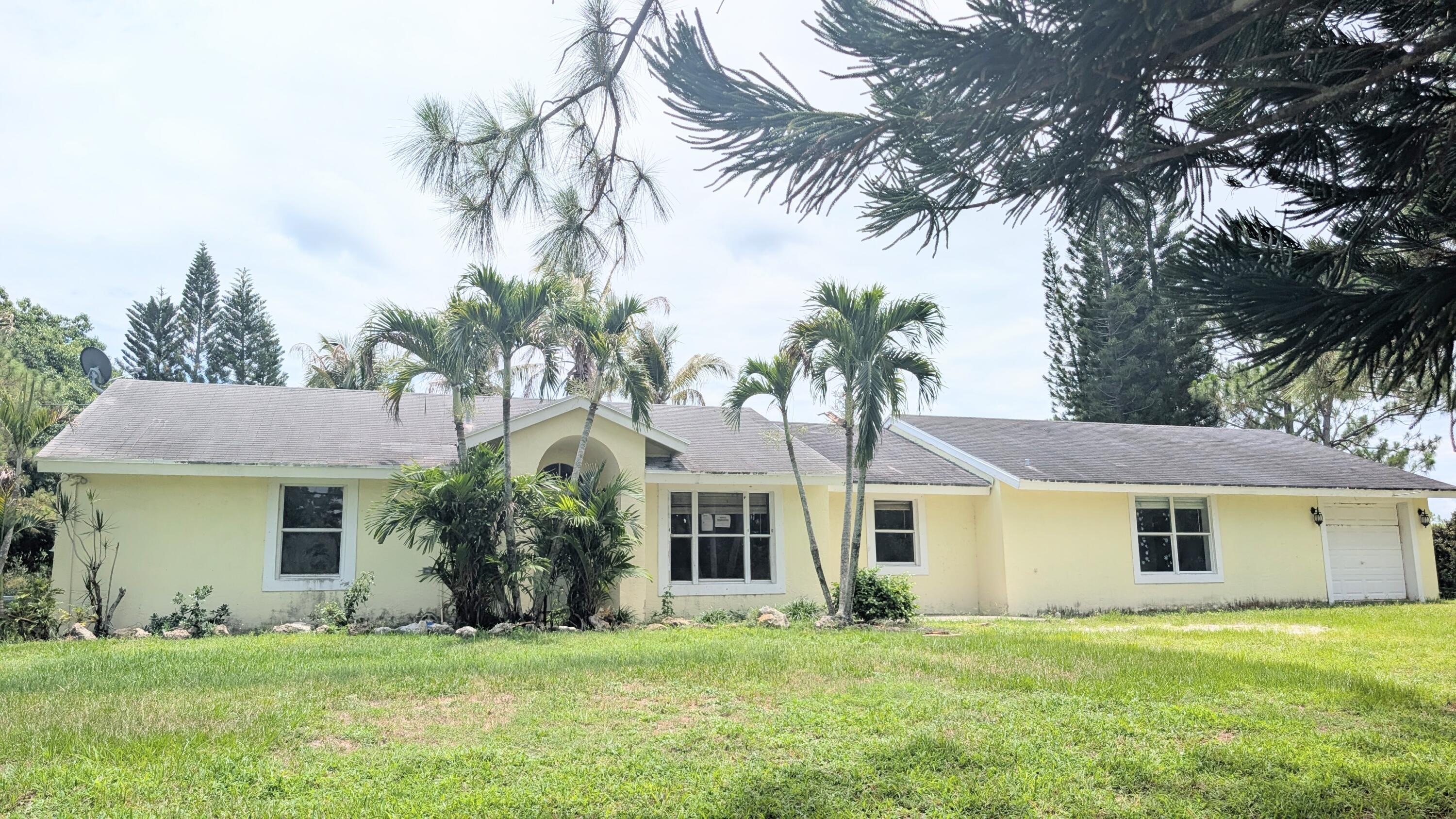 Great opportunity to own a 3-bedroom, 2-bath pool home situated on a large lot with plenty of room for boats, RVs, work trucks, trailers, and other recreational vehicles. The property offers tremendous potential and is ready for a new owner to make it their own. While some updates and repairs are needed, this home provides the perfect chance to customize and add value. Enjoy the spacious outdoor area, private pool, and endless possibilities this property has to offer.
