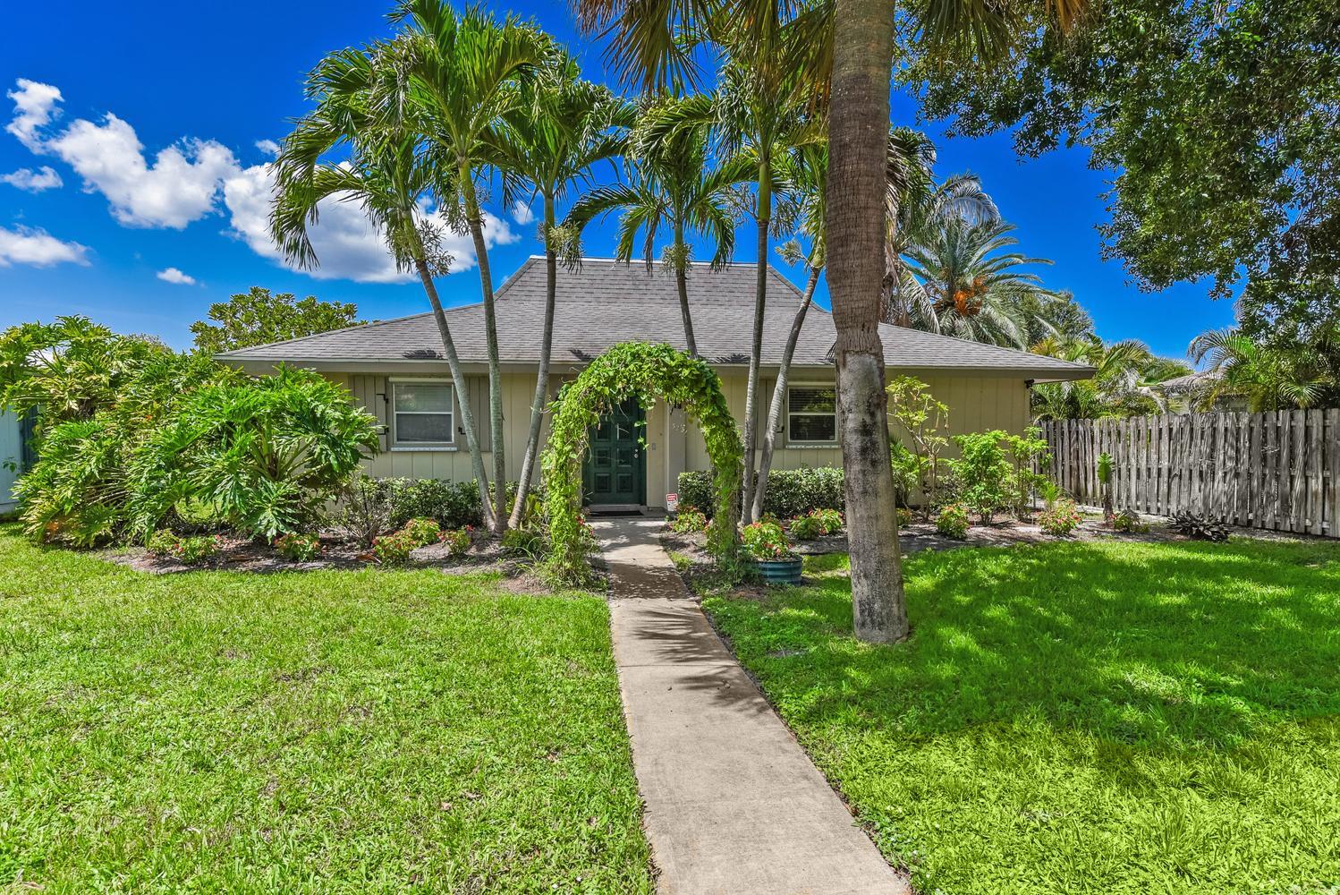 Welcome to this charming waterfront residence in Village Oaks Condo, Stuart, Florida.  Rare single-family home is one of only 12 detached condos!  This is a great hybrid for someone seeking single-family living with less headaches. It's the perfect fit for our Treasure Coast lifestyle in Stuart—low-key, comfortable, and community-oriented. The 2-BR, 2-BA layout is spacious, plus an enclosed Florida Room & a screened patio. As a waterfront property, this home delivers the distinctive appeal of water access in the heart of Stuart. This is an excellent opportunity to own a practical waterfront residence in an established community. Seller financing is available for qualified buyers up to $150,000 at 5.5% rate.