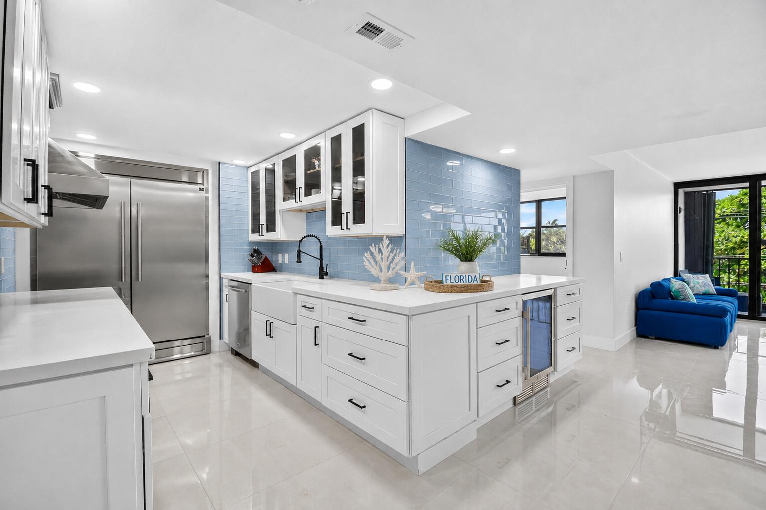 Experience the best of Florida waterfront living in this stunning 3-bedroom condominium situated directly on the Intracoastal Waterway. Enjoy breathtaking water views, access to your own private beach, resort-style amenities, and an unbeatable location just minutes from vibrant downtown West Palm Beach.  Offered fully furnished for a truly turnkey experience or available unfurnished to suit your style, this beautifully renovated residence is move-in ready. Featuring tile flooring throughout, an open-concept layout designed for entertaining, an industrial-sized refrigerator, wine cooler, and thoughtfully updated finishes, no detail has been overlooked. Additional conveniences include an in-unit washer and dryer and two designated parking spaces. The HOA fee covers internet, cable, water, building insurance, and exceptional amenities, making this the definition of low-maintenance luxury living.  Whether you're looking for a full-time residence, seasonal retreat, or investment opportunity, this exceptional waterfront condo offers the Florida lifestyle you've been dreaming of.