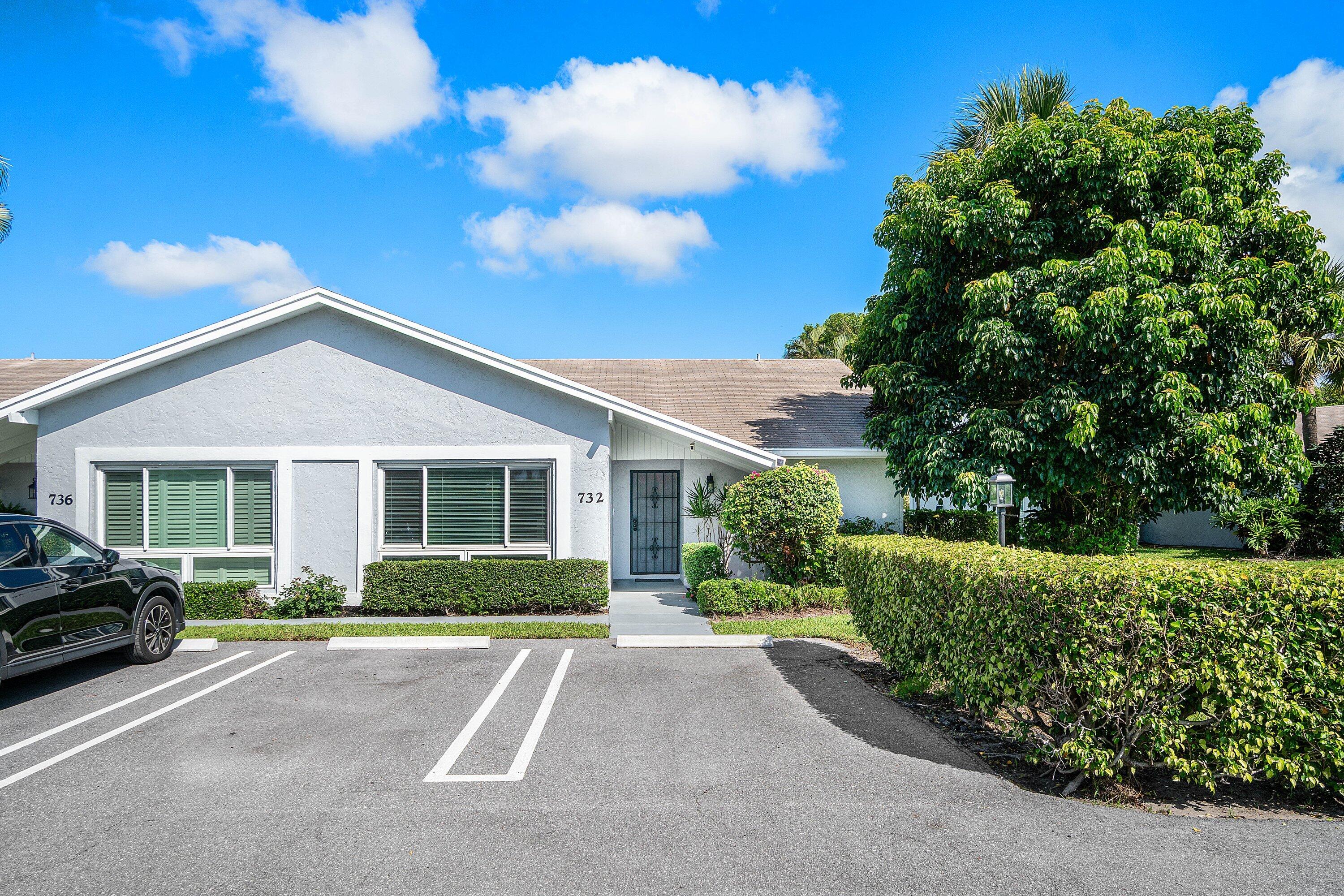 Rarely available & totally remodeled 2-bed, 2-bath END UNIT VILLA w/ bonus Florida/office, in Lago Del Rey, one of Delray Beach's most desirable communities. This light-filled home features an open-concept floor plan with new luxury vinyl plank flooring, vaulted ceilings, and high impact windows throughout. The beautifully renovated open kitchen and baths feature granite countertops, custom wood cabinetry, stainless steel appliances, and tiled showers with glass doors. The expanded Florida room—complete with a full impact glass wall and dedicated office/flex space—creates the perfect setting for either work at home, or everyday living. This exceptional home includes high impact windows, custom blinds, ceiling fans, a full-size washer & dryer, and numerous additional upgrades throughout! All-age community offering a clubhouse, pool, pickleball, tennis courts, and more. Ideally located just steps away from the newly renovated Delray Beach Public Golf Club, featuring an 18-hole, par-72 championship course enhanced by a $28 million renovation. Only 2.5 miles from Atlantic Avenue's renowned dining, shopping, beaches and nightlife! Just a 10-minute drive to FAU. Investor-friendly with immediate leasing permitted. Minimum lease term is 90 days, with up to two leases allowed per year.