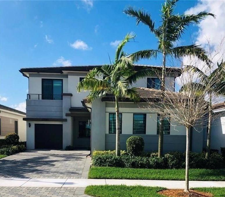 Move in ready, contemporary and much sought after DELLA model in CASCATA. One bedroom with full bath on main. Kitchen boasts all stainless steel appliances, gas stove, granite countertops, upgraded backsplash, eat in kitchen area and large island. Perfect for family and entertaining. Primary bath has been renovated with real marble floors, stand alone tub, large glass shower for 2, private commode and separate sink areas. Primary bedroom also boasts two large walk in closets and sitting area. Lake views. Washer/dryer upstairs. 3 Bathrooms upgraded w/real marble floors. Custom window shades. Covered back patio. Open floor plan. Many amenities such as new clubhouse with gym, resort style pool & much more. Parkland A+ rated schools, close to highways, restaurants and shopping. Must see!