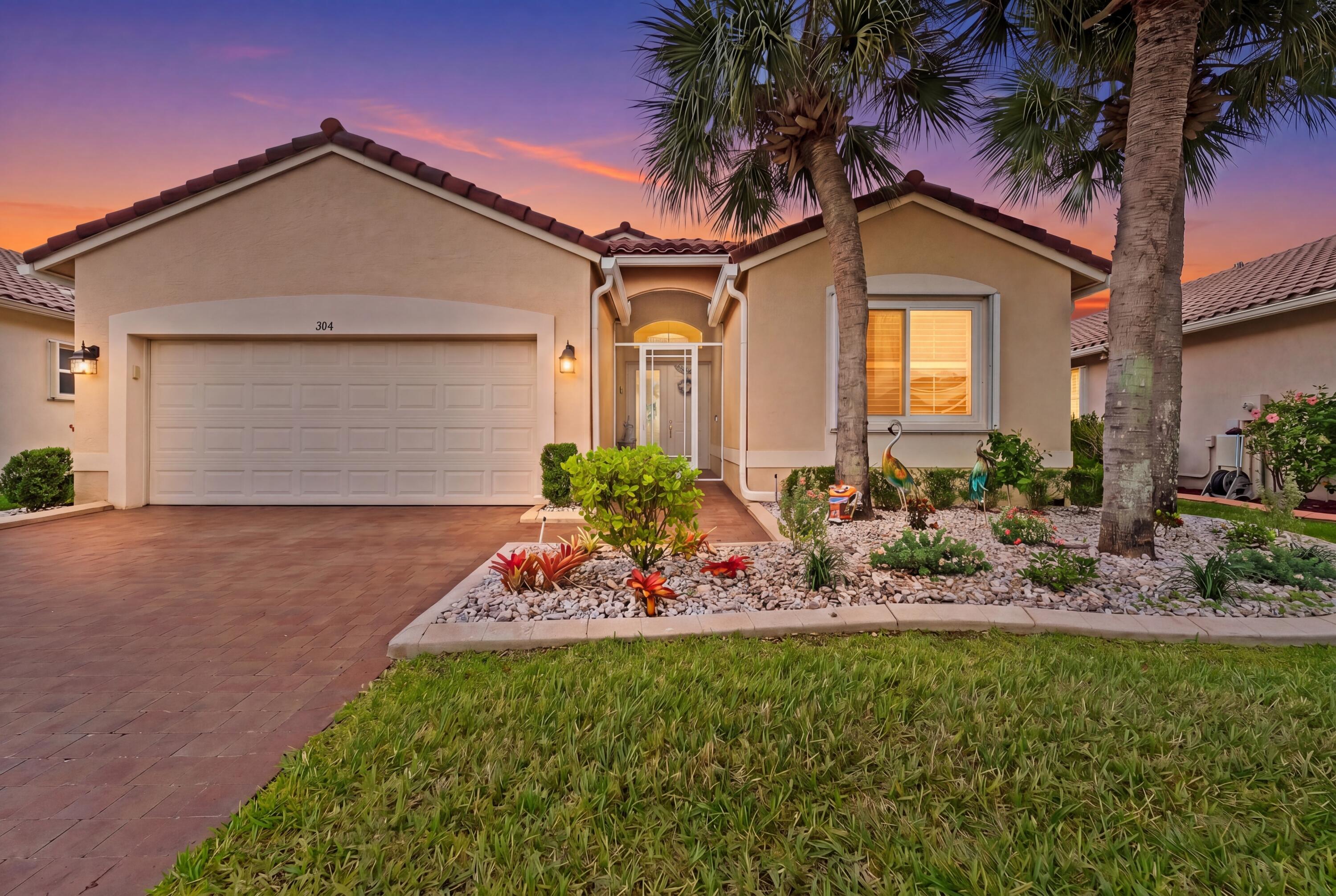 This well kept waterfront home in the beautiful adult community of The Cascades offers the Florida lifestyle you've been looking for.  An enlarged screened lanai offers a calming water view & welcome breezes & great space to entertain!  The open floorplan boasts an upgraded kitchen w/extra wood cabinets, granite & tile backsplash, plus 2 eating areas.  Easy upkeep includes tile floors in main areas w/ newer laminate floors in the bdrms & den.  A 2025 whole house generator, IMPACT glass & ACCORDION SHUTTERS offer comfort & safety, too.  A 26,000 sq ft clubhouse & sports area inc.a ballroom, 3 card rooms, craft rm, library, gym, dance/yoga rm, billard rm,& saunas + a resort size pool/spa & Tiki bar, tennis, pickleball, 9 hole golf & 50+ clubs to enjoy!  You've earned this lifestyle-call now! Other property features inc. crown moldings, plantation shutters, hand painted side glass to front door, vaulted ceilings, natural gas appliances & rubberized garage flooring.
