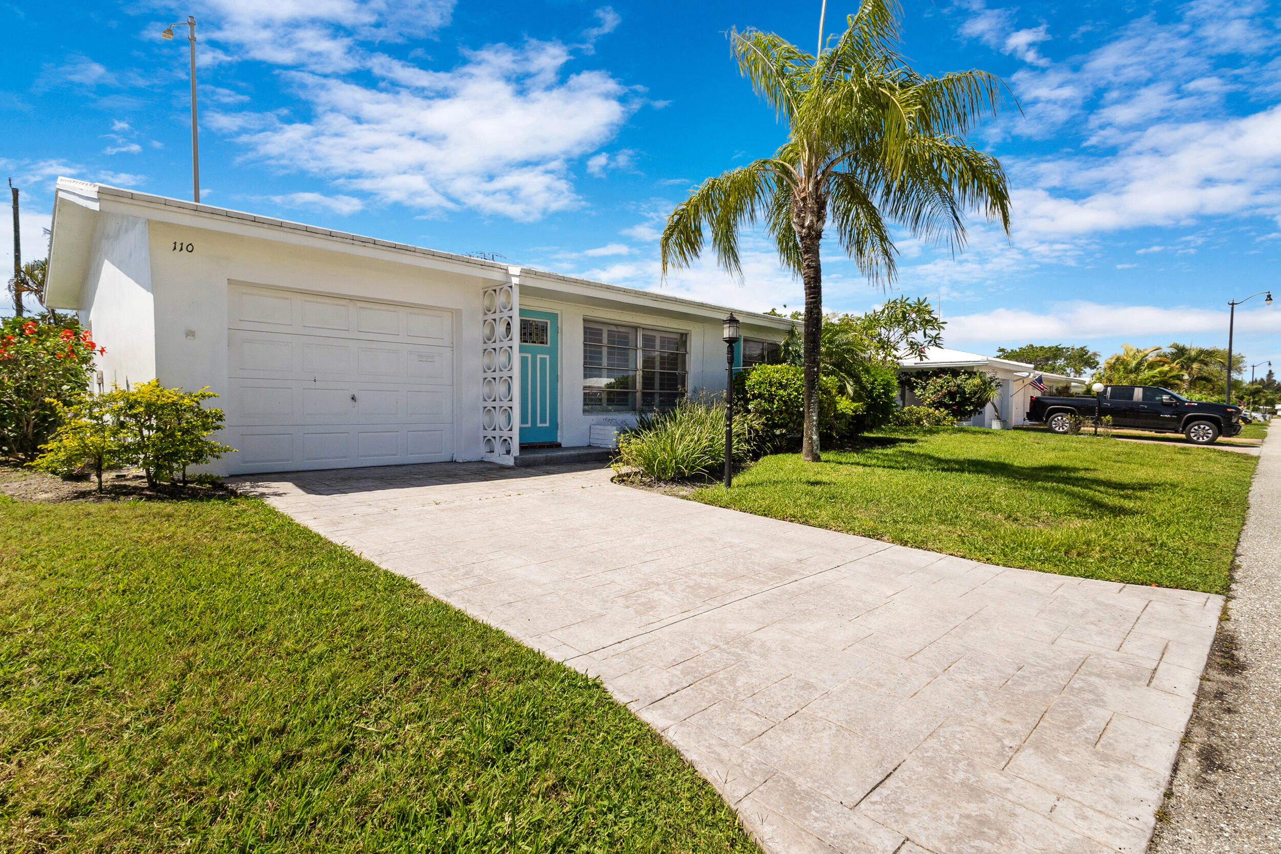 BACK ON MARKET! Buyer financing fell thru! Absolutely charming home in Leisureville (55+). With only 1 owner since original build, this 2/1 home has been lovingly maintained thru the years. Ceramic tile floors, plantation shutters, an enclosed Florida Room, and plenty of storage space make it easy to add your personal touches to make this a cozy place you'll love to call home. The kitchen features soft-close cabinetry with pull-out shelves, granite countertops and dual basin sink. Flat roof (2025), concrete tiled roof (2013), W/H (2019), A/C (2018). Leisureville is an impeccably well maintained community w/2 clubhouses, free golf for residents, short walk to pool and NO LAND LEASE!  MUST OWN 1 YEAR BEFORE LEASING. Some photos are virtually staged to illustrate the design potential.