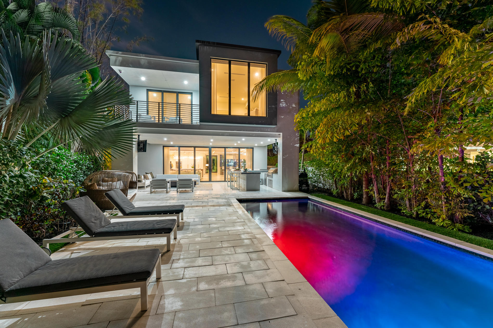 Gated Modern, Waterfront Estate presents a rare opportunity to live just steps away from the finest Las Olas Shops and Restaurants. This modern DEX Homes masterpiece was built to accommodate the best of all worlds.  Coherent living, work and entertainment spaces seamlessly integrate in this innovative design.  This highly efficient 5/5, 3 car garage home has over 6000 sf of custom luxury.  Tech modern(ipad integrated)security, Outdoor kitchen and bar, infinity pool, with lush tropical landscaping, 36' deep ocean access with no fixed bridges! See supplemental info for further information. This Gated Modern, Waterfront Estate presents a rare opportunity to live just steps away from the finest Las Olas Shops and Restaurants. This modern DEX Homes masterpiece was built to accommodate the best of all worlds.  Coherent living, work and entertainment spaces seamlessly integrate in this innovative design.  This highly efficient 5/5, 3 car garage home has over 6000 sf of custom luxury, all carefully developed around a palatial 100+ year old triple oak tree. Exquisitely finished with the best modern features -- two story glass entry with floating wood staircase and glass rail. The foyer boasts  a 332- bottle two-story temperature controlled wine cellar.  Social spaces utilize, oversized neoteric porcelain slab tiles. 600 gallon jellyfish tank brings the wow factor with personalized LED lighting! bedrooms feature gorgeous wide plank oak floors. The sleek, two-tone kitchen has double islands, both tremendous in size, Thermador appliances, a chefs delight. Custom designed master suite with separate his/her bathrooms, outfitted closets with biometric safe. 
Private, ground floor in-law suite/gym features its own entrance.  Smart home automated with remote control blinds & shades. In-home elevator,
spectacular entertaining areas that seamlessly integrate outdoor and indoor living spaces.  Tech modern(ipad integrated)security, Outdoor kitchen and bar, infinity pool, with lush tropical landscaping, 36' deep ocean access with no fixed bridges! Two separate laundry/utility areas, & so much more!

Courtesy of: Dustin Joseph Berk

Please contact: Dustin J. Berk of Mizner Grande Realty for private showings, &/or questions.