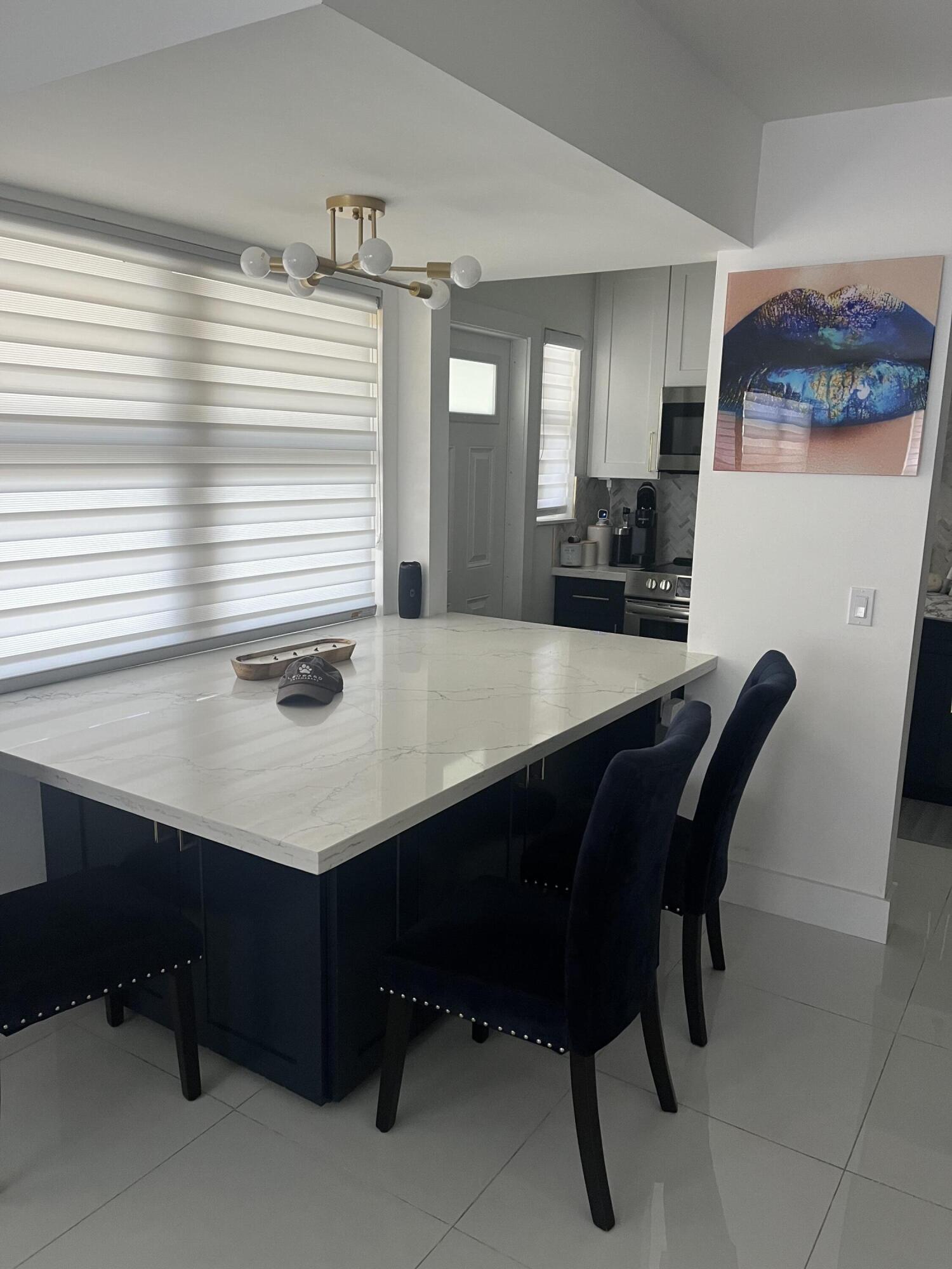 Renovated !    compact windows , new appliances   , white tile floors throughout,  new  ceiling fans new window treatments and  fresh paint . Private parking for one car , being sold unfurnished . Ready to move in for the season ! Listing agent is the owner , call for an appointment .