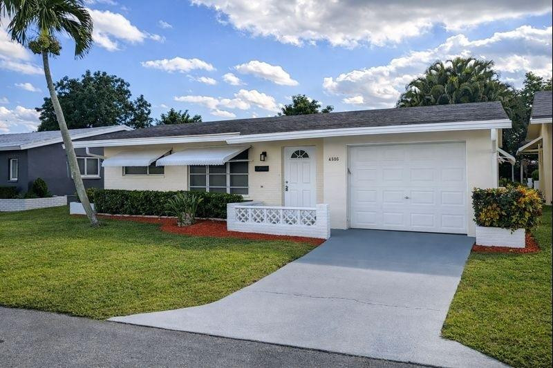 MAJOR PRICE IMPROVEMENT - SELLER READY TO MAKE A DEAL! Turnkey 2-bedroom, 1-bath home with garage in Mainlands of Tamarac—one of the best opportunities in the community right now. Move-in ready with updated kitchen and bath, stainless steel appliances, new laminate flooring, fresh paint, high baseboards, formal dining area, and enclosed patio ideal for relaxing or entertaining. Low HOA and access to community clubhouse and pool. Centrally located near shopping, dining, and major highways for convenience. Seller is motivated—submit all offers. Buyer concessions available with a bona fide offer. Owner financing and lease purchase options may be available for qualified buyers. Vacant, easy to show, and priced for immediate attention—act quickly before it's gone.