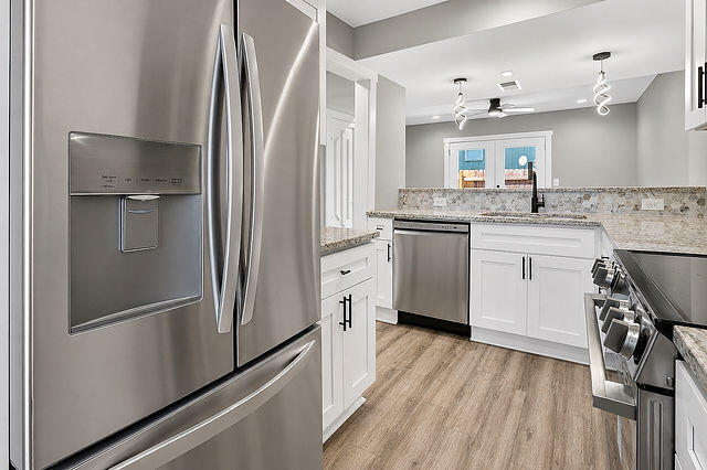 Fully Renovated TownHouse with NO HOA *** Welcome to this Beautifully remodeled corner unit gem, featuring 2 Bedrooms + 2 FULL Bathrooms, elegant modern finishes and thoughtful upgrades throughout. Enjoy cooking and entertaining with brand-new LG appliances, including a Smart ThinQ oven with a built-in air fryer designed for today's convenient lifestyle. Plus, fire escape ladders installed in both bedrooms for peace of mind. Perfect for first-time homebuyers or investors seeking excellent rental or Airbnb potential, This home is conveniently located minutes from Hartsfield-Jackson Atlanta International Airport, vibrant downtown districts, trending restaurants, golf courses, metro stations, and Tyler Perry Studios. Stylish, move-in ready, and close to everything Atlanta has to offer!