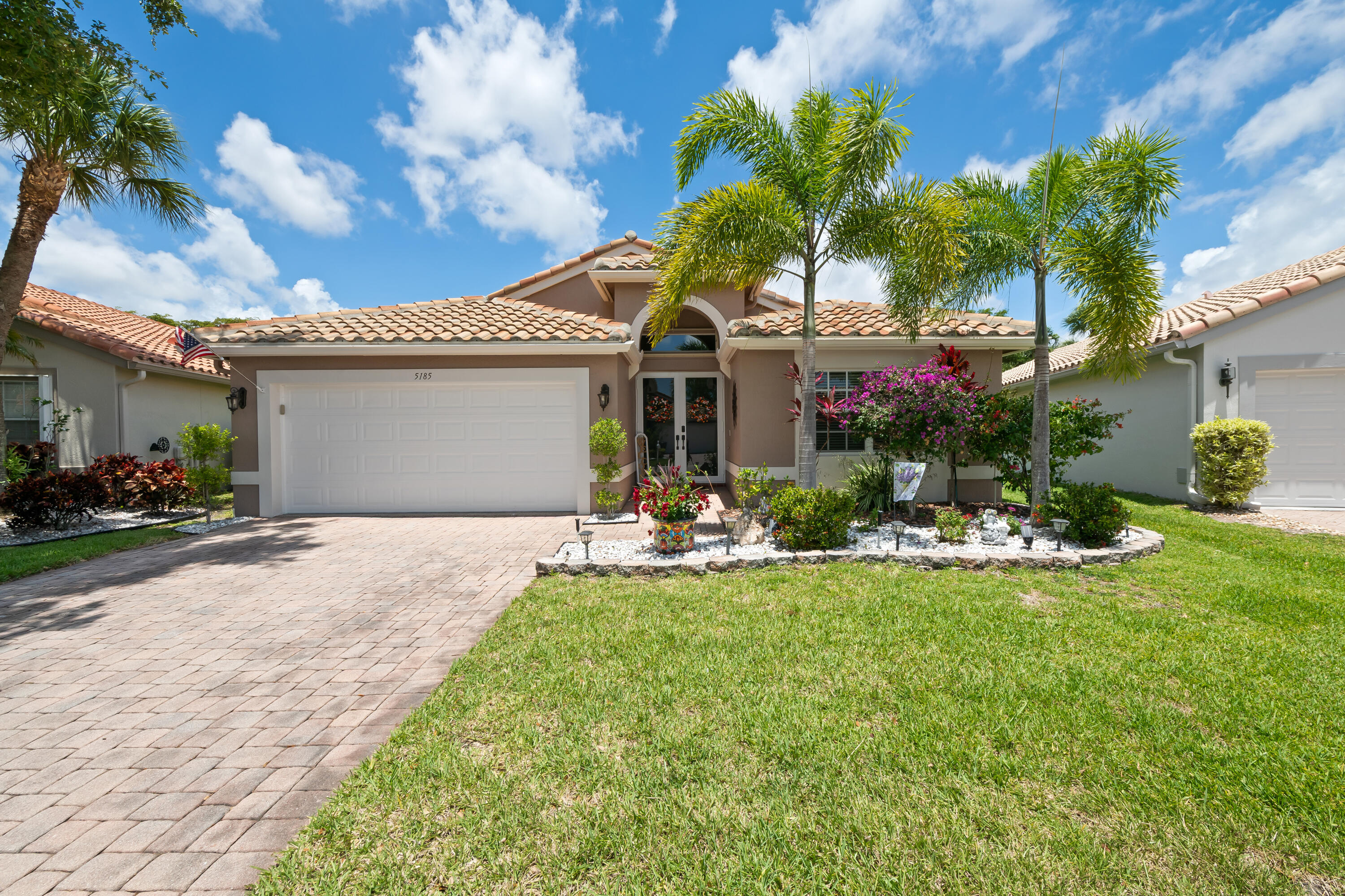 Sought-after Cypress III model on a premium wide lot in the desirable 55+ gated community of Cascade Lakes! This beautifully maintained home features a granite kitchen with updated cabinets, new impact windows and French front door, with accordion shutters on the back sliding doors. The flexible floor plan includes a third bedroom currently used as a den/office. Enjoy an active community lifestyle with exceptional resort-style amenities including indoor/outdoor pools, a state-of-the-art fitness center, ballroom, card rooms, library, billiards room, arts & crafts room, bocce ball, and an active tennis and pickleball community. Maintenance fee includes cable, internet, home security system, landscaping, painting of exterior home (every 6 years), and power washing of roof (every 2 years).