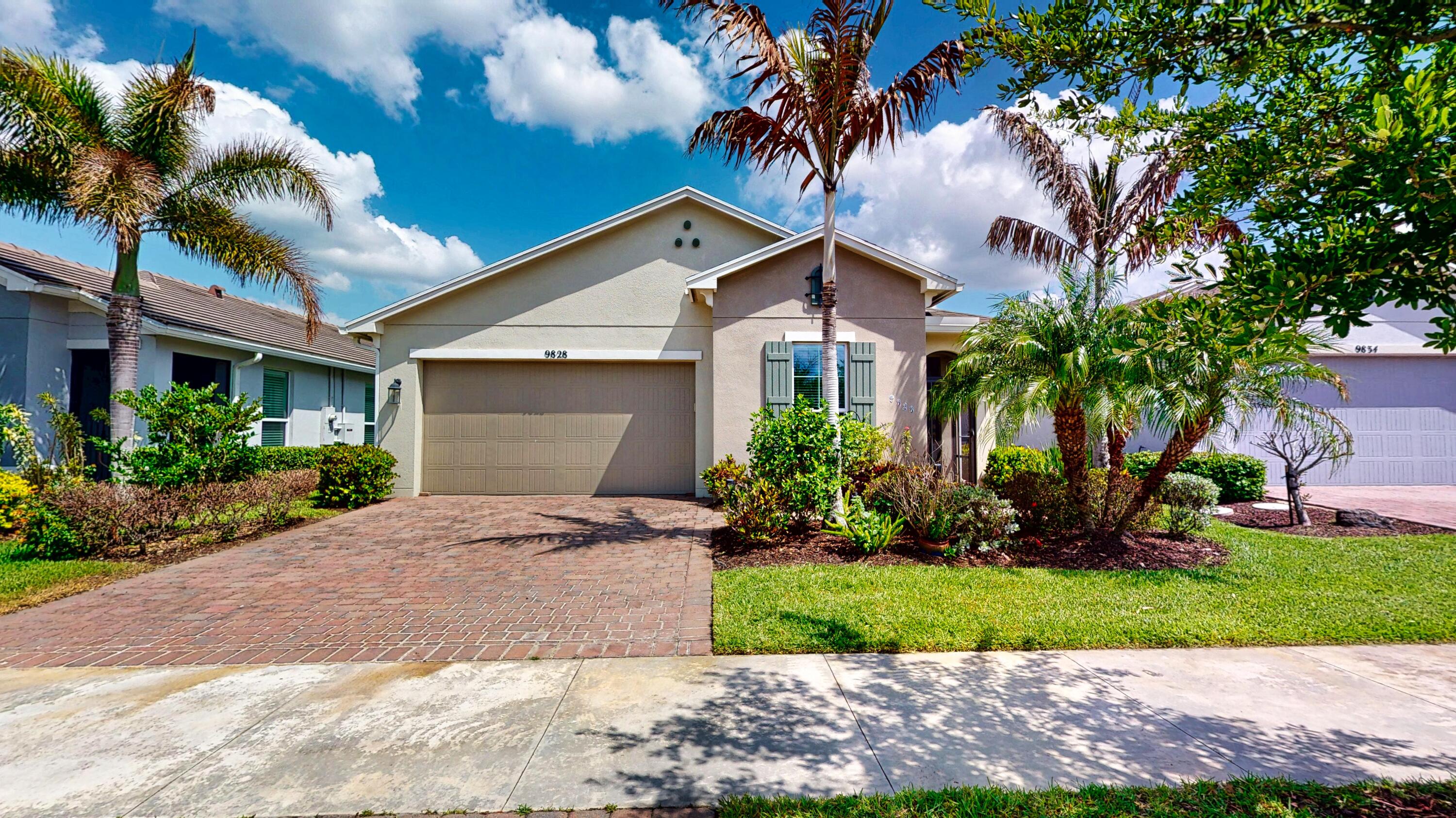 Welcome to this beautifully designed 2-bedroom, 2-bath home with a versatile den, located in the highly sought-after Vitalia at Tradition. Offering just under 1,700 square feet of living space, this home features a spacious open floor plan perfect for both everyday living and entertaining. The kitchen, dining, and living areas flow seamlessly together, creating a bright and inviting atmosphere. The kitchen is equipped with 42-inch cabinets, granite countertops, and ample storage. The oversized primary suite provides a relaxing retreat with a large walk-in closet, dual vanities, and a walk-in shower with a glass enclosure. The guest bedroom is thoughtfully positioned near a full bath, offering comfort and privacy for visitors.   A versatile den at the front of the home is ideal for a home office, hobby room, or additional guest space. Step outside to the covered and screened lanai—perfect for enjoying Florida living year-round. Residents of Vitalia at Tradition enjoy a vibrant 55+ lifestyle with resort-style amenities, including a clubhouse, fitness center, resort pool, tennis and pickleball courts, walking trails, and a full calendar of social activities—all within one of Port St. Lucie's premier master-planned communities.
