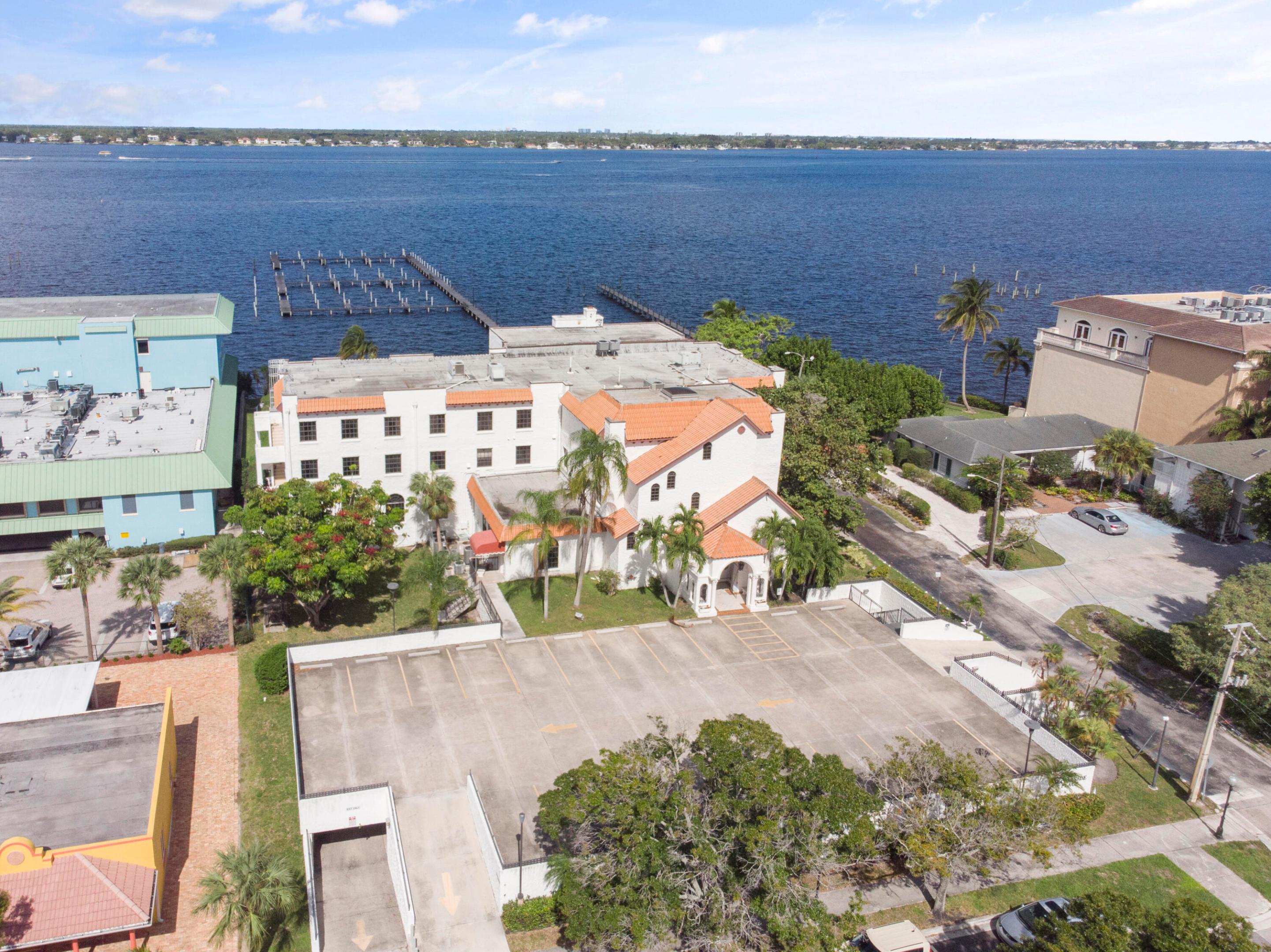 Rare waterfront offering in downtown Stuart with Urban Waterfront zoning. Current use is professional office, with flexibility for mixed use, residential, hospitality, or marina operations (subject to approvals). The site features an office building of 25,000+ SF on SE Osceola Street with St. Lucie River views and dockage under a state lease (36 slips). Excellent redevelopment potential with walkable access to restaurants, shops, the Riverwalk, and the proposed Brightline station. Sale is subject to lien releases and required approvals; buyer to perform due diligence.