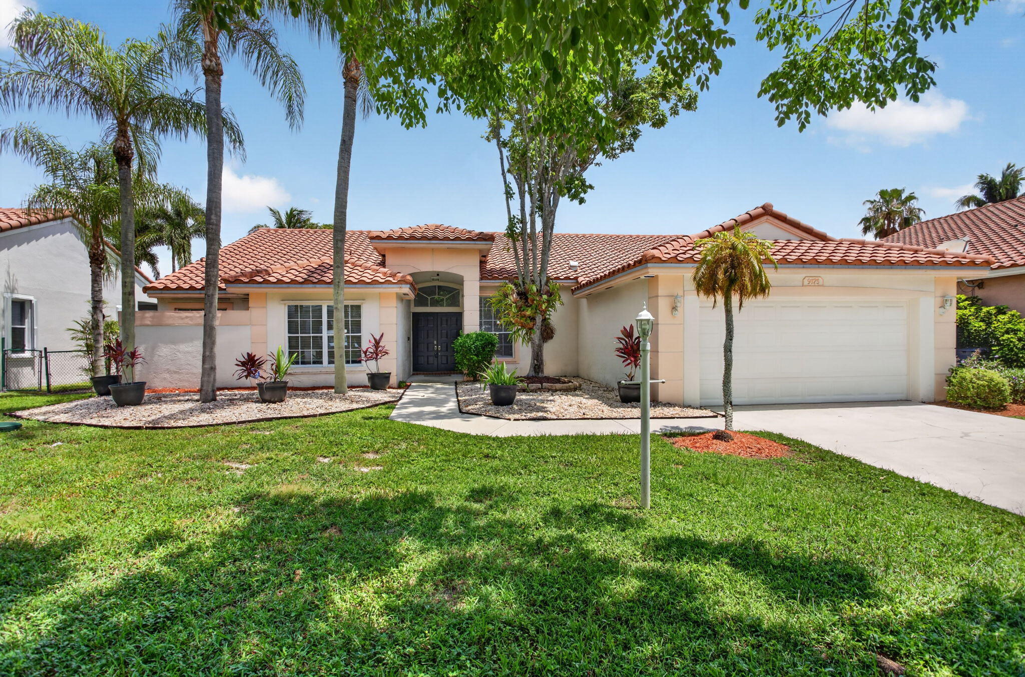 Welcome to this charming single-story residence in Coventry, Coral Springs. This well-appointed pool home features four generous bedrooms and 2.5 bathrooms spread across 2,432 square feet of finished living space. The practical floor plan accommodates a two-car garage, providing convenient storage and vehicle protection. Built on a single level, this property offers seamless flow throughout the home, making it easy to navigate and maintain. Located in the established Royal Land Amended community, this residence presents an excellent opportunity for those seeking comfortable, functional living in Coral Springs.
