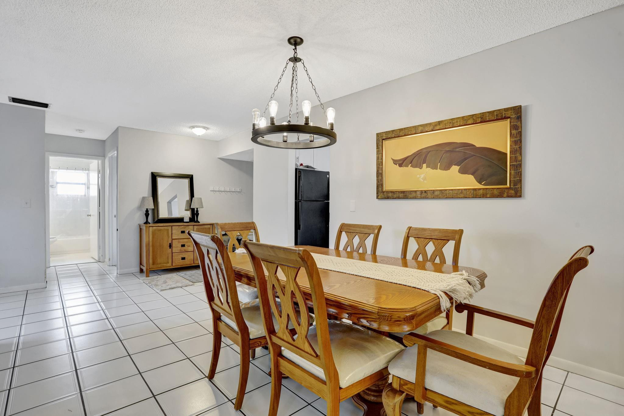PRICED TO SELL at $274,900, this 3-bedroom condo in Applewood Village 2 in The Township offers incredible value, featuring a 4th bonus room and access to resort-style amenities. This unit features wood and tile flooring, hurricane shutters, and a Florida room with an A/C vent that can also serve as a versatile 4th bonus room for extra living space. Updates:2023 A/C and 2018 water heater. Washer & Dryer included! HOA dues cover water, cable, internet, exterior building insurance, roof maintenance, trash, and sewer. Residents enjoy top-tier amenities, including a theatre, aquatic center, fitness room, tennis and pickleball courts, and a basketball court. Easy access to Florida’s Turnpike, I-95, and Sawgrass Expressway.