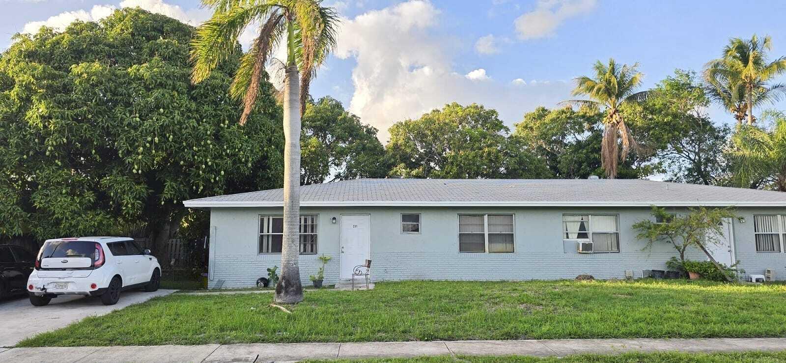 No HOA, strong income-generating duplex opportunity near downtown Boynton Beach, featuring two well-designed 2-bedroom, 2-bath units. Each unit includes its own private driveway and washer/dryer hookup, ideal for tenant comfort and retention. Offering a 6.64% cap rate, this property delivers solid returns in a high-demand rental market. Ideally located just minutes from the beach, Downtown Boynton Beach, and major corridors like Interstate 95, providing easy access to shopping, dining, and employment centers. A turnkey investment with immediate cash flow potential.