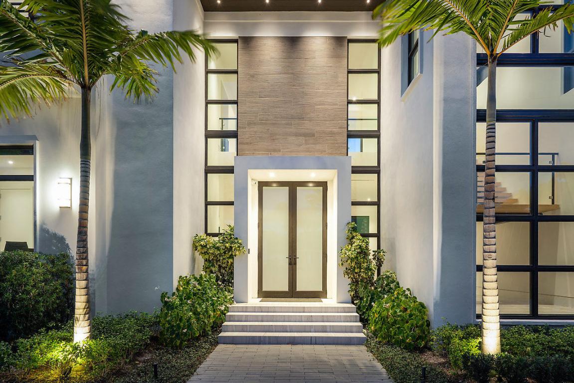Upon entry, this newly constructed residence in the exclusive Seagate area of Delray Beach elegantly articulates the ideals of classic modern style. Designed by award winning architect Richard Jones and impeccably finished by Nines Development using a diverse array of natural materials and textures, the home features an open and gracious floorplan.  The two-story residence totals 7,240 t/- sq. ft.  with five bedrooms, 5.3 bathrooms, a first-floor club room, second floor loft space and a sumptuous first floor owner's suite complete with sitting area, a lavish bathroom overlooking a tropical garden all affording a perfect retreat. The home reveals stunning twelve-foot high ceilings throughout the ground floor, floating ceilings and walls, recessed moldings and linear vents. A cutting-edge kitchen includes eight feet of refrigeration including wine storage, top of the line Miele appliance, four foot range, three ovens, two dishwashers and walk in pantry, custom designed island, a dining and relaxation zone that function as the social hub of the home. Contemporary design features include a private courtyard with fire pit, 6x3 raw Italian porcelain, impact windows, smart home functions, 10 foot pocket sliding glass doors that seamlessly provide fresh breezes and streaming light.  Complementing the iconic design, the Zen like saltwater pool with two covered loggias, outdoor shower, sun shelf, spa and summer kitchen encompass the perfect Florida lifestyle and take outdoor entertaining to a new level.  Quite simply, the home expresses pure perfection. Close proximity to the beautiful Atlantic Ocean and a wealth of luxuries and conveniences found on Atlantic Avenue.