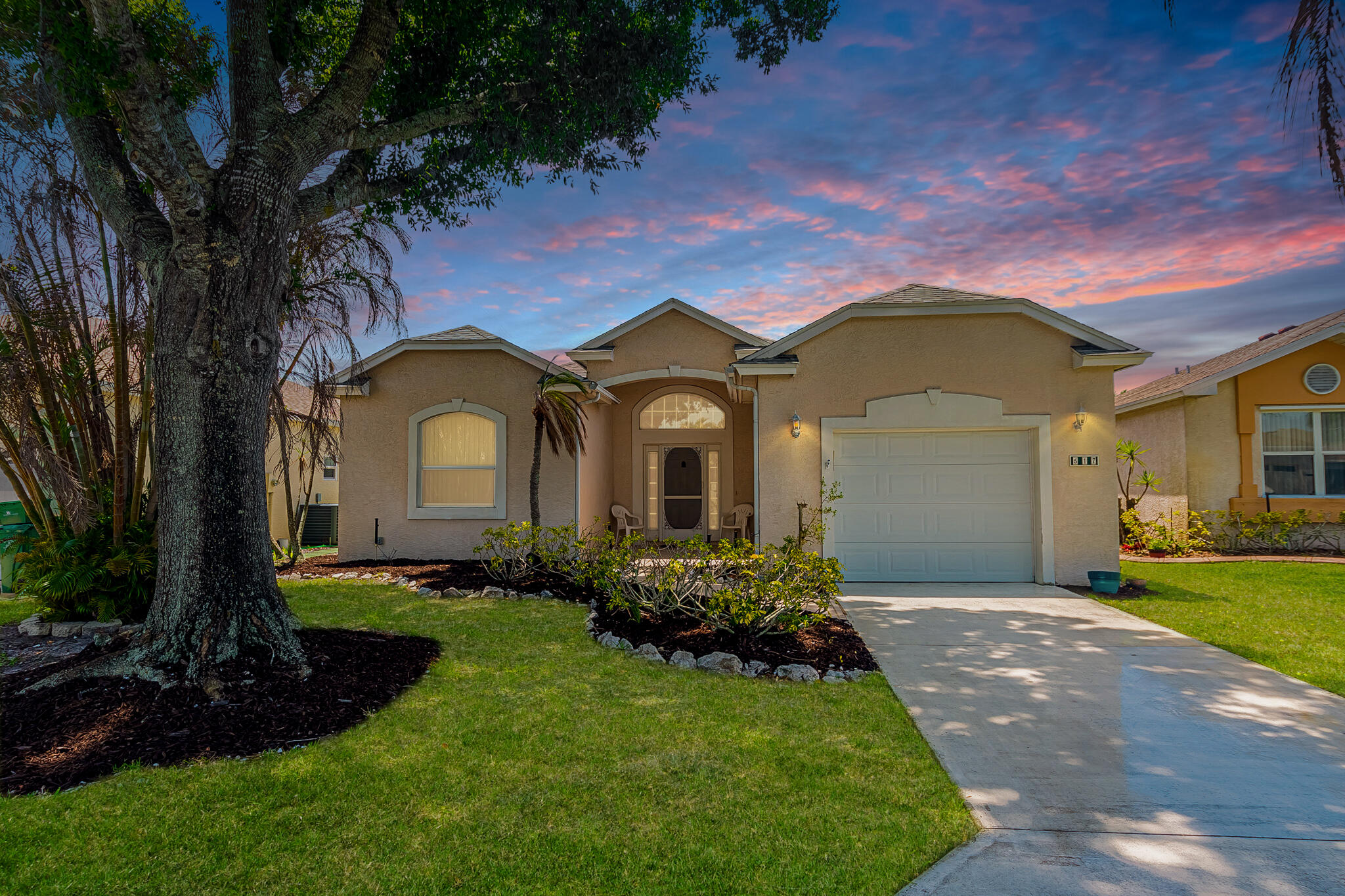 Located in the gated 55+ active community of Kings Isle, this CBS home in the Isle of San Marino offers a tranquil lakefront setting. New Shingle Roof included! This home features 2 bedrooms, 2 bathrooms, plus flex room and a split floor plan designed for privacy and comfort. The spacious living area flows into a bright kitchen with a breakfast nook and snack bar. The primary suite serves as a quiet retreat with walk-in closets, dual sinks, and a separate shower. Enjoy serene water views from the screened and covered patio. Kings Isle residents enjoy resort-style amenities, including a clubhouse, fitness center, pickleball, and tennis.