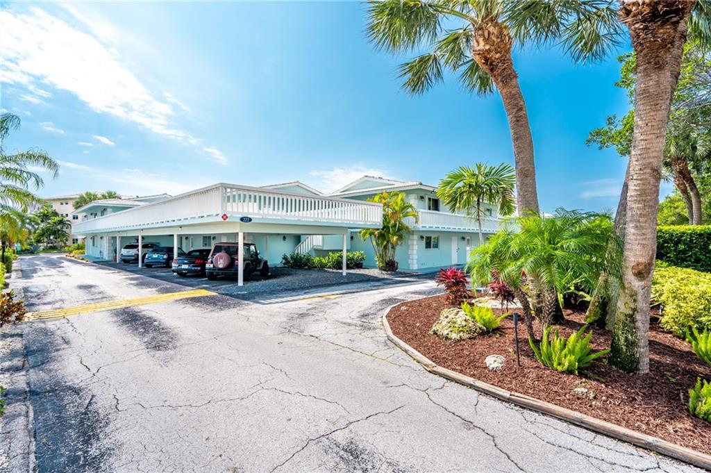 Amazing first floor condo in excellent condition.   Lots of natural light.   Screened patio for easy pool access.  Covered parking just outside the condo entrance.   Hurricane windows and doors.   Newer A/C .  Newer water heater.  Newer appliances.