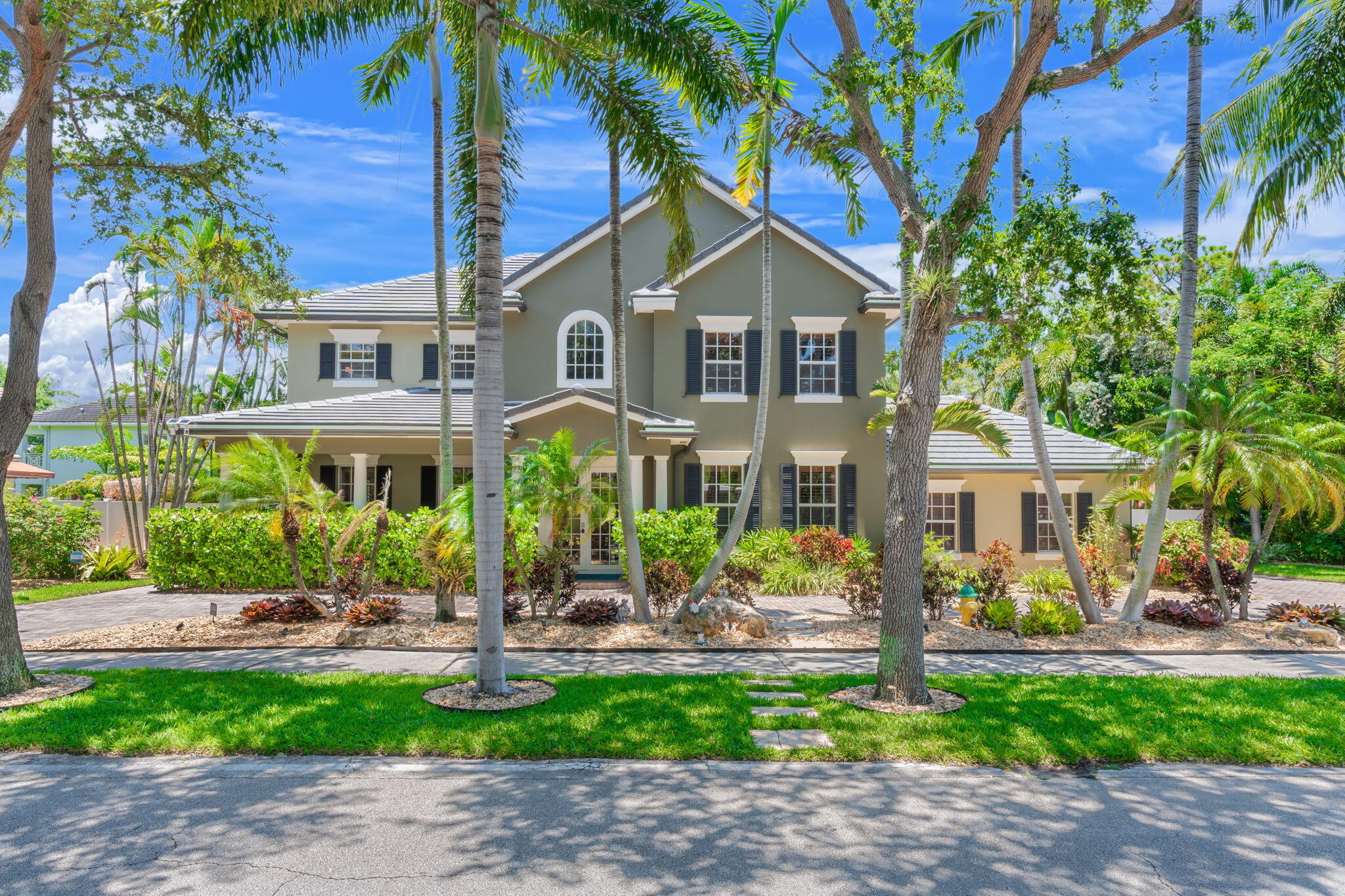 Imagine waking up in this gorgeous newer-construction (2006) home in the heart of Wilton Manors. Designed to appeal to the most discerning buyer, it features a brand-new roof (2026) w/warranty, 2 new HVAC systems, fresh interior & exterior paint, a new privacy fence surrounding an oversized lot, surveillance, poured concrete construction, & termite protected. Enjoy a dedicated gym, an expansive family room w/a 100-inch Smart TV, & a huge open kitchen w/stainless steel appliances & gas cooking,  All en suite bedrms, perfect for entertaining family & friends. Step outside to a screened porch, outdoor shower, pristine low-maintenance landscaping, & a sparkling saltwater pool. Adjacent to a park. With 4,023 sq. ft., living area, this home has it ALL!  Easy to show. A Glen Wright Design.