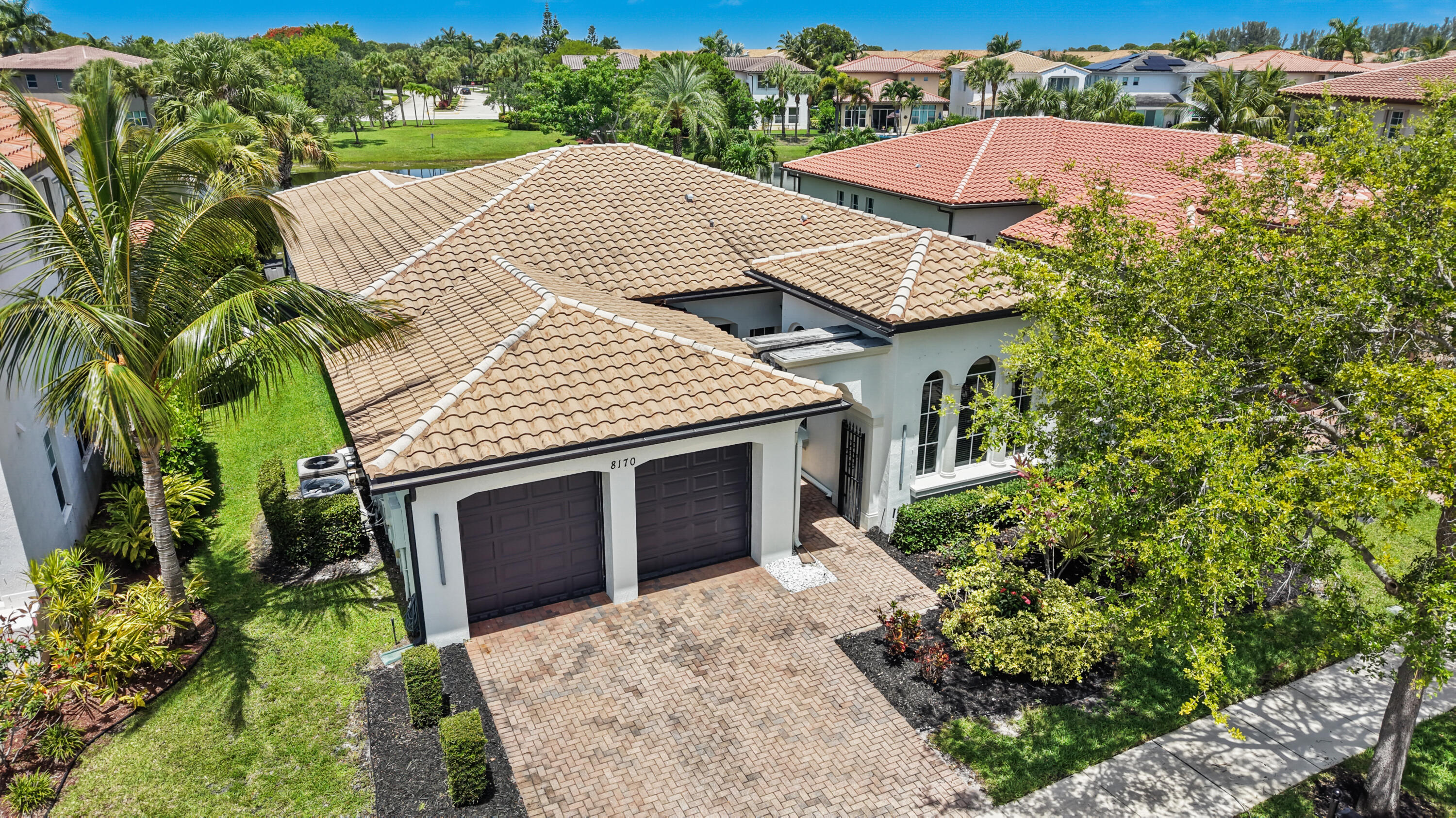 Discover this beautifully maintained 4-bedroom, 3-bath single-story home in the highly desirable Banyan Isles at Heron Bay. Offering over 2,700 sq. ft., this home features a sought-after triple-split floor plan, soaring 12' ceilings, expansive windows, and breathtaking lake views that fill the home with natural light. Enjoy Florida living on the marble pool deck with a spacious pergola, perfect for entertaining. Low HOA of just $342/month includes 2 resort-style clubhouses, fitness centers, tennis, pickleball, basketball and volleyball courts, a water park, scenic walking and biking paths, and 3 gated entrances.