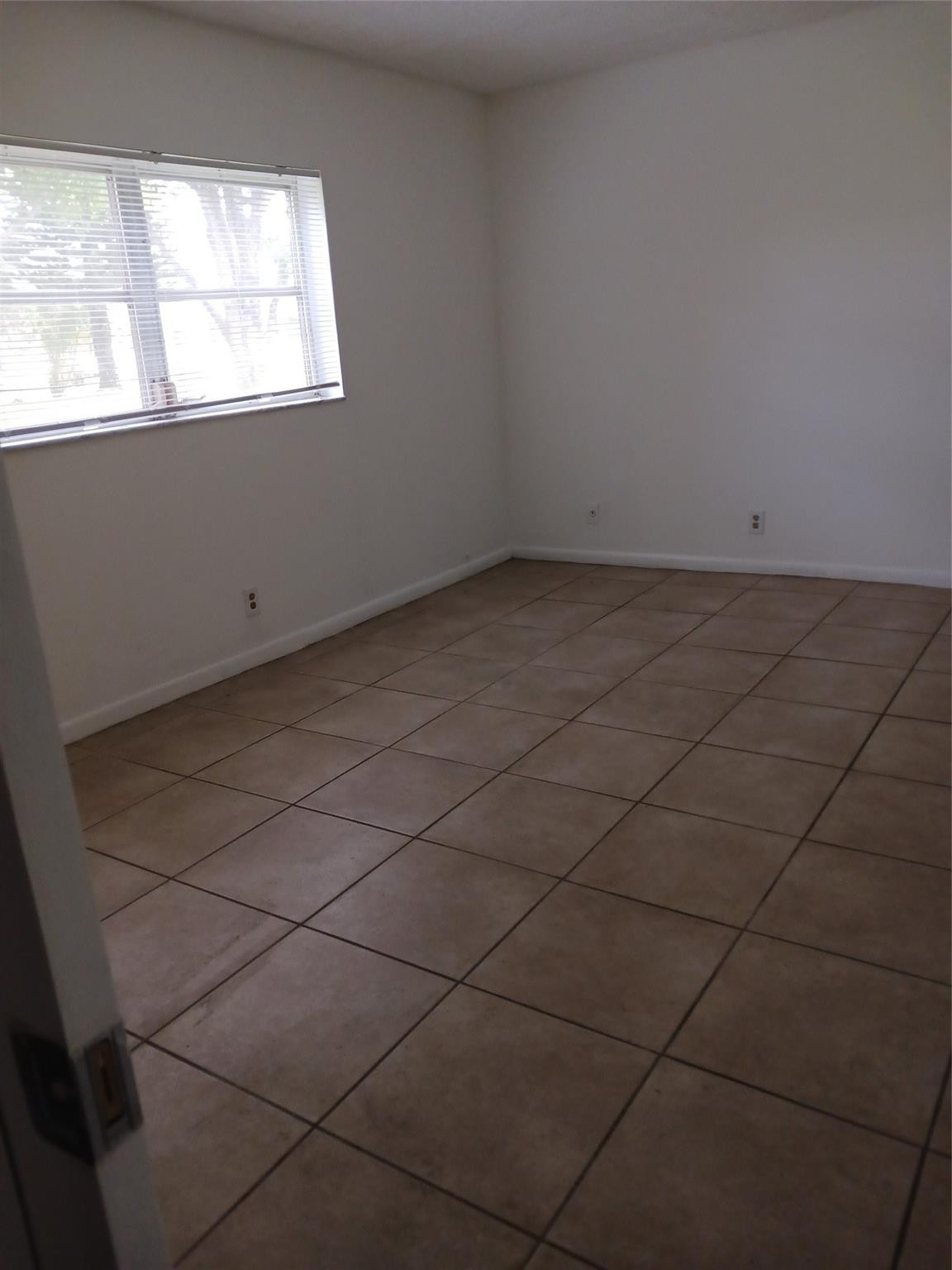 Oriole gardens phase ONE--WHEELCHAIR ACCESSABLE- 55 plus community - NEWLY REFRESHED-All white kitchen- 2/2 ground floor- newer a/c - neutral ceramic tile throughout the entire unit. screened patio with hurricane shutters- great location across from a shopping center and near bus stop to the beach and mall. Can be rented after owning it for 3 years  new buyers can have 1 car only and at least a 675 credit score