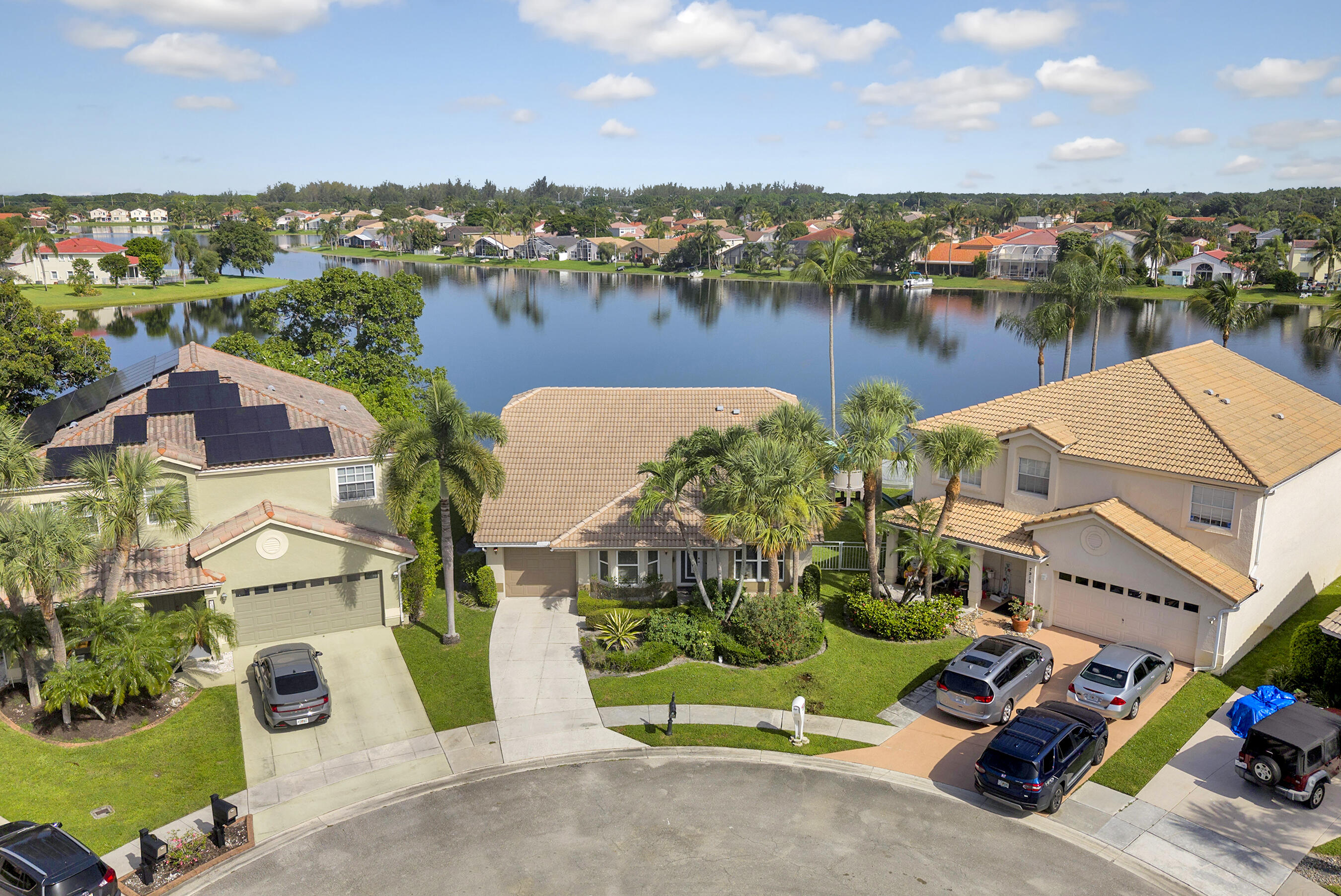 Looking for the perfect lakefront lifestyle without the hefty price tag? Tucked away in the middle of a quiet cul-de-sac, this well-maintained home is move-in ready with full impact glass (windows, doors, and sliders), a 2021 AC, and a 2023 water heater. The backyard features a gorgeous lake view and a private pool with a newer heater and pump. The ultra-low HOA covers your cable and high-speed internet, and your large pups are welcome here—up to two large dogs allowed! Plus, you're within walking distance of amazing community amenities (soccer, tennis, basketball, a community pool, and playgrounds) and zoned for top-tier schools like Manatee Bay, Christa McAuliffe, and Park Vista.