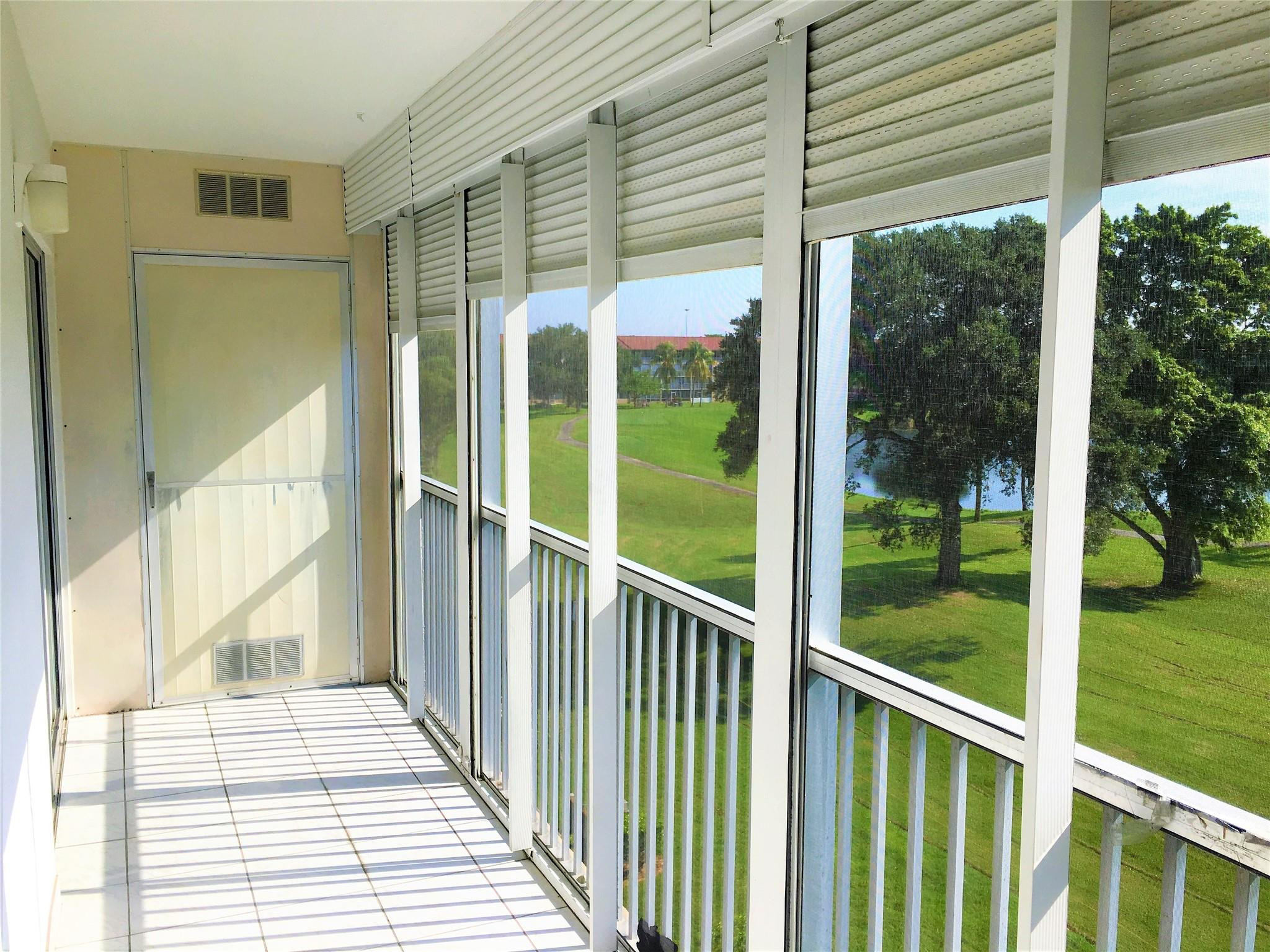 GREAT INVESTMENT! RENTED TO A LONG TERM TENANT. GET INCOME ON DAY 1.  THIS VERY CLEAN TOP FLOOR 2 BEDROOM 1.5 BATH CONDO FEATURES BEAUTIFUL LAKE AND GOLF COURSE VIEWS, UPDATED KITCHEN WITH STAINLESS STEEL APPLIANCES, TILE AND LAMINATE FLOORING, SCREENED-IN BALCONY WITH HURRICANE SHUTTERS, EXTRA BIG WALK-IN CLOSET AND LOTS OF STORAGE. BRAND NEW A/C. LAUNDRY IS JUST DOWN THE HALL. COMMUNITY INCLUDES MILLION DOLLAR CLUBHOUSE, 2 FITNESS CENTERS, POOLS, FREE BUS TRANSPORTATION TO SHOPPING CENTERS, 24 HOUR SECURITY, MOVIE THEATER, SHOWS, GOLF, CAFE, PHARMACY, SOCIAL ACTIVITY CLUB. CALL NOW FOR MORE INFORMATION.