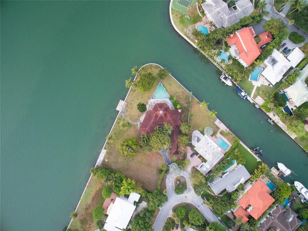 UNIQUE DEVELOPMENT OPPORTUNITY IN THE ISLAND OF BAY POINT! COMBINE 2 WATERFRONT LOTS TOTALING 50,077 SQUARE FEET (LOT 9 IS 20,100 SQ FT AND LOT 10 IS 33,977 SQ FT) AND 446 LINEAR FEET ON THE WATER OVERLOOKING BISCAYNE BAY! BUILD YOUR DREAM ESTATE HOME WITH A DREAM VIEW. BAY POINT IS A PRIVATE, SECURED GATED COMMUNITY. SHORT DISTANCE FROM WYNWOOD, DESIGN DISTRICT, MIDTOWN AND MIAMI NIGHTLIFE. LISTING PRICE INCLUDES 2 ADJACENT WATERFRONT LOTS - LOT 9 AND LOT 10.