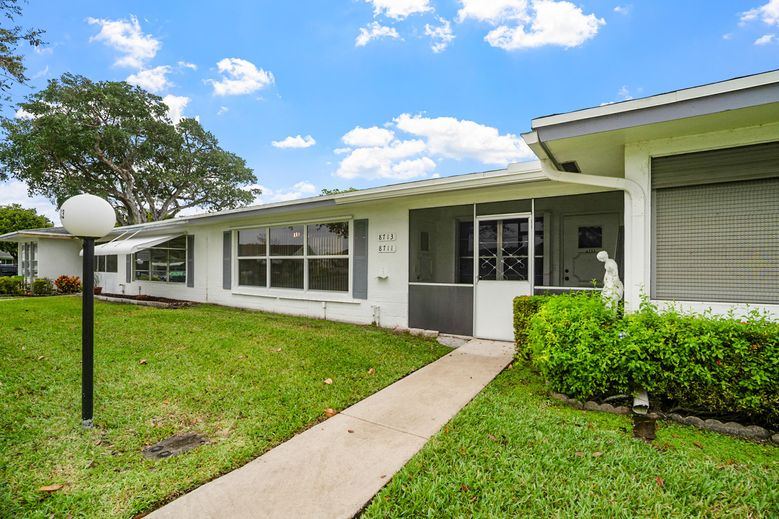 LAUDERDALE WEST 55+ Community, 1 Bedroom/2 full bath, super clean, IMPACT windows, extra room, huge principal bedroom suite w/large walk-in closet, updated kitchen and baths and lovely tile thru-out. Close to shopping, dining, and entertainment. 2 parking spaces at your doorstep. Cable TV & Internet included.  Two heated swimming pools, hot tubs, sauna, pool tables, ping pong, professional woodworking shop, arts & crafts, fully equipped fitness center, professional shows, parties, dances and more. Rear patio. A minimum credit score of 720 please. Showings by appointment ONLY.