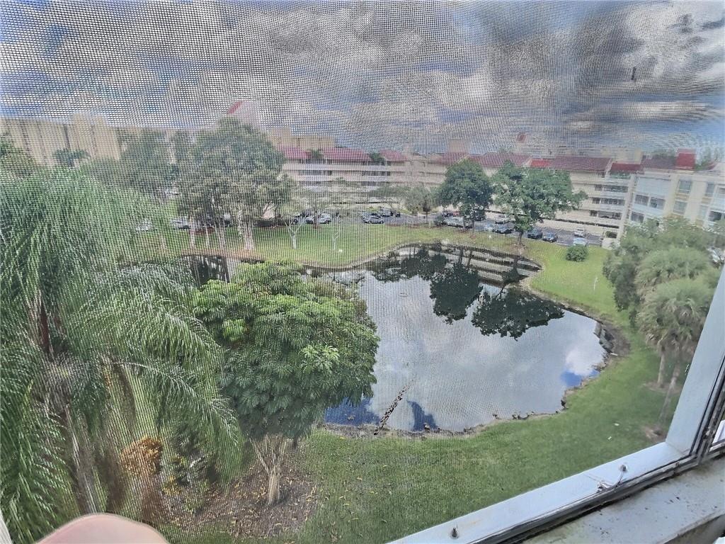 Two bedroom two bathroom in the highly sought after Environ phase 1 condominium. This spacious unit has tile floor throughout and is ready for its next owners. Sit out on your balcony and enjoy the serene lake views at sunset!! Both bedrooms are generously spaced and master has a walk-in closet.Maintenance includes: Pool, Exterior Insurance Basic Cable, Water, Trash, 24HR Security. No Renting 1st Year!
