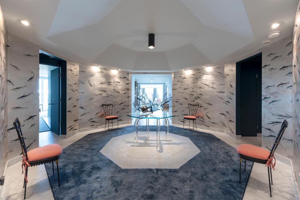 High design in high places. This exquisite 3,100 sqft 3 bedroom, direct ocean, top floor apartment was completely renovated by one of the country's most respected designers as his own residence. Literally nothing left unconsidered and untouched, right down to the triple-layer impact glass windows and doors. There are touches like beautifully lacquered bookshelves, honed marble floors, DeGournay wallpaper, and of course, top-of-the-line appliances. See Documents for a more complete list and the Virtual Tour for the full experience. 
2100 is one of the premier buildings in Palm Beach with unmatched levels of white glove service. Pool, beach and 6 Har-Tru tennis courts with pro shop. 
Unit comes with a beautifully finished cabana, 2 large storage units and garage parking for 2 cars.