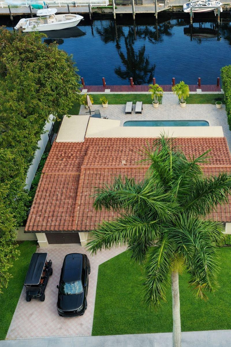 Waterfront living at its finest! This 3-bedroom, 2-bath pool home offers over 70 feet of waterfront, a private dock, and direct ocean access. Bring your boat and enjoy the ultimate South Florida boating lifestyle.  The home features an updated kitchen with custom cabinetry, natural stone and wood flooring, a Wolf gas stove, impact windows and doors, a resort-style pool, covered patio, fully fenced yard, and spacious paver driveway.  Located less than 2 miles from the beach and just minutes from dining, shopping, marinas, and everything Pompano Beach has to offer. Rarely available waterfront rental with private dockage and ocean access.  Information deemed reliable but not guaranteed. Tenant to verify all information.