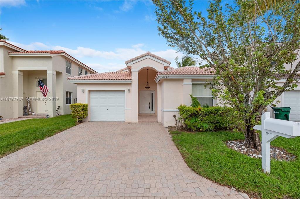 Beautiful 3 bedroom 2 bathroom home in gated Coral Bay community. This home features vaulted ceilings, tile and wood laminate flooring throughout, an updated kitchen with stainless steel appliances and granite counter tops, an enclosed backyard, and a 1 car garage. A/C approximately 2 years old. The master bedroom has a large walk-in closet and large master bathroom with a separate shower and bathtub. This home also has an ADT alarm system, a Nest thermostat and is in close proximity to the community pool. Conveniently located close to shopping, dining, entertainment, and access to highways. This would be a great place to call home.