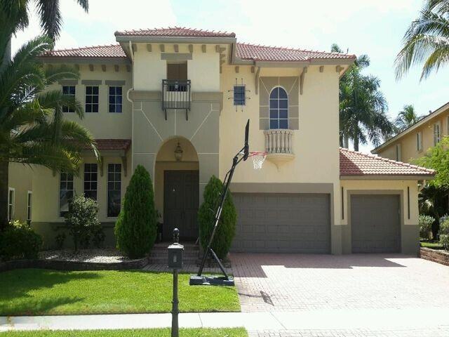 4BR/3BA lakefront pool home with a spacious loft (easily converted to a 5th BR), 3-car garage, and over 4,000 SF of living space. Major recent updates include a NEW ROOF (2024), remodeled kitchen (2023), NEW kitchen appliances (2026), both A/C units replaced (2024), interior and exterior paint (2023), backyard pavers (2024), NEW pool equipment and saltwater system (2025), and NEW washer/dryer (2026). The spacious floor plan features soaring 20+ ft ceilings in the living and dining rooms, abundant natural light, and an oversized lakefront backyard with desirable eastern exposure and beautiful sunrise views. Located in Heron Bay's sought-after Highlands community, residents enjoy resort-style amenities, multiple pools, fitness centers, tennis courts, parks, walking trails, and access to top-