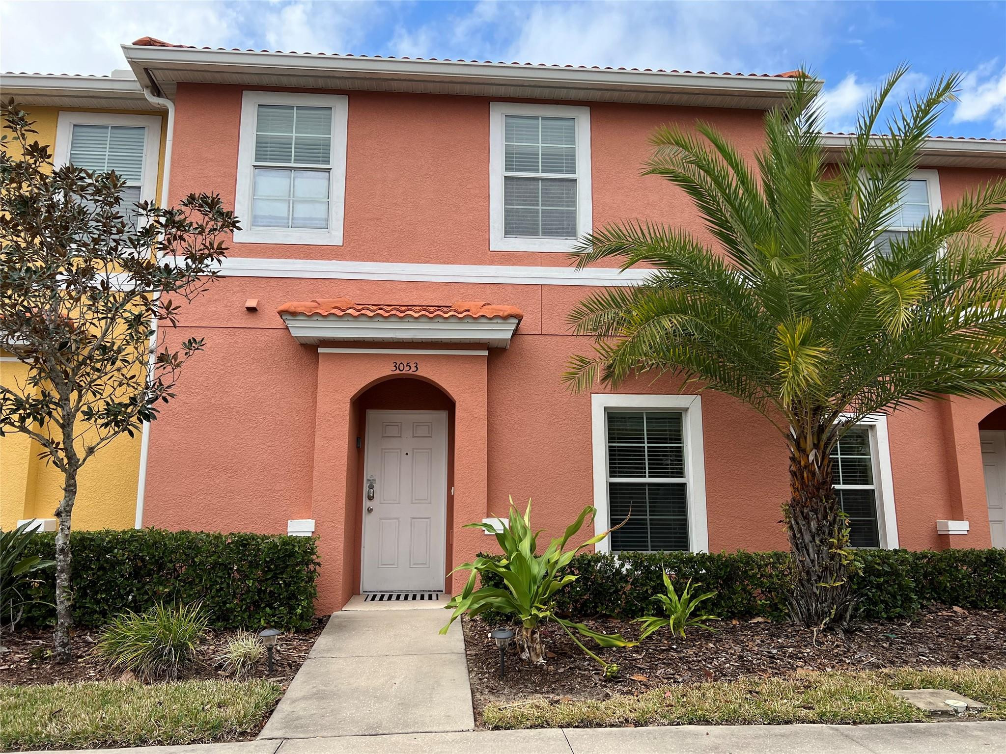 Excellent Investment Opportunity for Short-Term Rentals, a Vacation Home, or a Year-Round Residence.  Close proximity to Disney World Theme Park, entertainments, restaurants, and shops.  2-story townhouse unit in a desirable Guarded Gate community with Resort Style amenities.  Functional layout with Three bedrooms and Three full bathrooms.  One Bedroom and One Bathroom is on the 1st floor.  Full-sized washer & dryer. Screened patio.  Updated kitchen.  Basic Cable TV and Wifi services are included in monthly maintenance.  Call Now to schedule a tour.