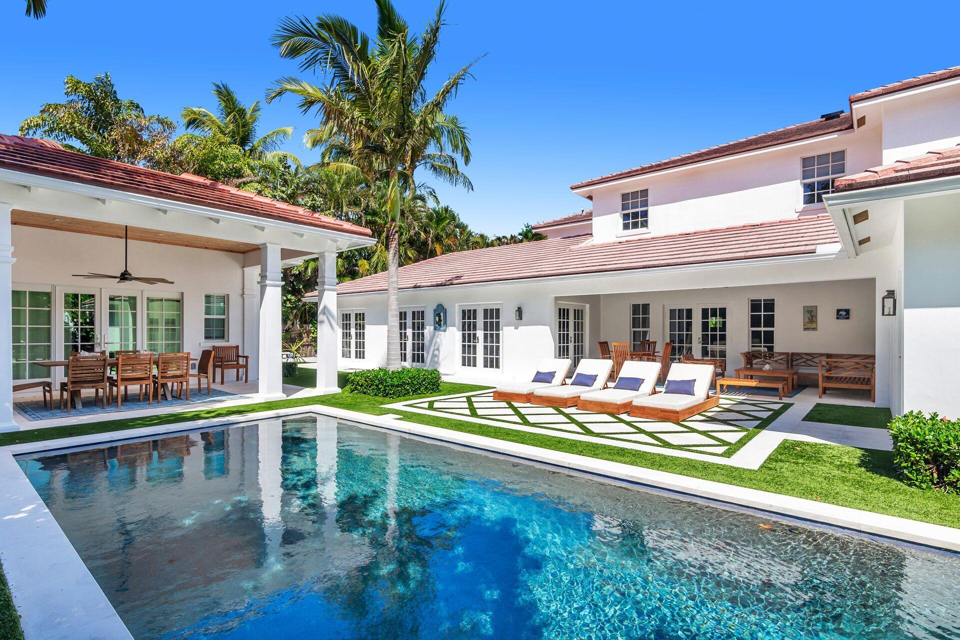 Enjoy luxury living at this Historic El CID Estate. Situated on a spacious 13,000 square foot lot on the prestigious Intracoastal block, this magnificent property offers an unparalleled lifestyle experience. Step inside the 5 bedroom, 4.5 bath main house and be greeted by dramatic high ceilings meticulously designed to offer both comfort and elegance. The newly constructed 1/1 Guest house/Cabana provides additional space for guests or can serve as a tranquil retreat for relaxation. Boasting new wide plank oak floors in the expansive living room sets the stage for effortless entertaining. Whether hosting intimate gatherings or grand affairs, the seamless flow of this home ensures every occasion is memorable. The first-floor primary suite exudes sophistication and charm, featuring a newly renovated bathroom that epitomizes luxury living. Retreat to this serene oasis after a long day and indulge in ultimate relaxation. Step outside and discover a world of resort-style amenities awaiting you. A brand new heated pool and spa beckon for leisurely dips or rejuvenating swims, while the covered loggia provides the perfect setting for alfresco dining or lounging in the shade. No detail has been spared in crafting this luxurious retreat. Additional features include a 2-car garage, a full house generator, an outdoor shower, updated plumbing and electrical systems, and full hurricane impact windows and doors. The vibrant community of El CID awaits. From its tree-lined streets to its proximity to beaches and fine dining, Worth Ave, and Palm Beach International Airport.