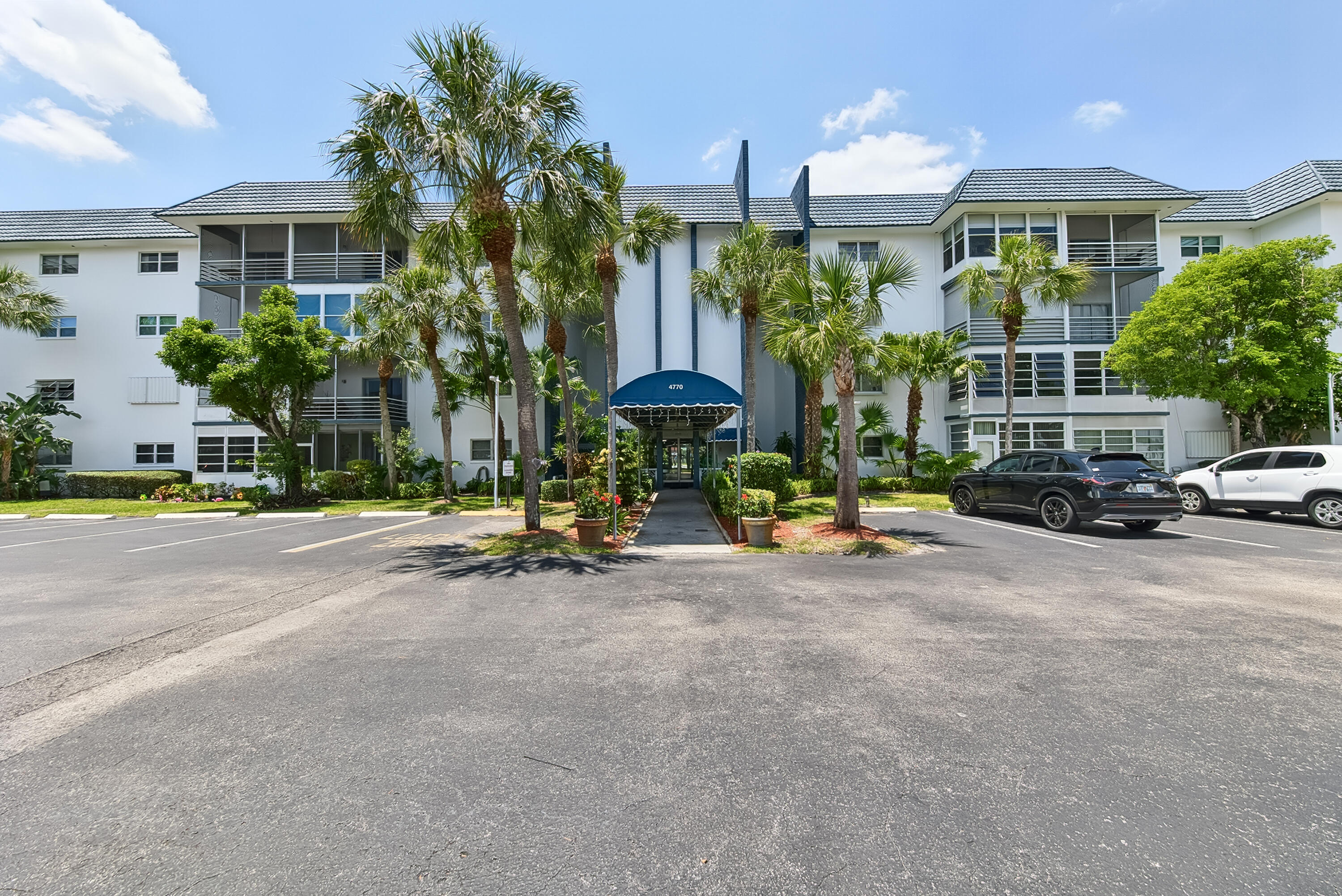 Spacious top-floor 1 Bed/1.5 Bath condo in the active 55+ community of Castle Gardens — and the lowest priced unit in the community! This unit features a screened-in patio, oversized walk-in closet, and a secure building with elevator, laundry rooms on 2nd and 3rd floor, storage, and pool just steps away. The Castle Gardens community is loaded with amenities all included in the low monthly maintenance fee -- featuring a clubhouse, billiards, bowling, card room, courtesy bus, 2 gyms, and 3 swimming pools. A fantastic primary residence or investment opportunity with strong upside potential. Conveniently located near shopping, dining, major transportation, Central Broward Park & Broward County Stadium and 20 minutes from Downtown Fort Lauderdale.