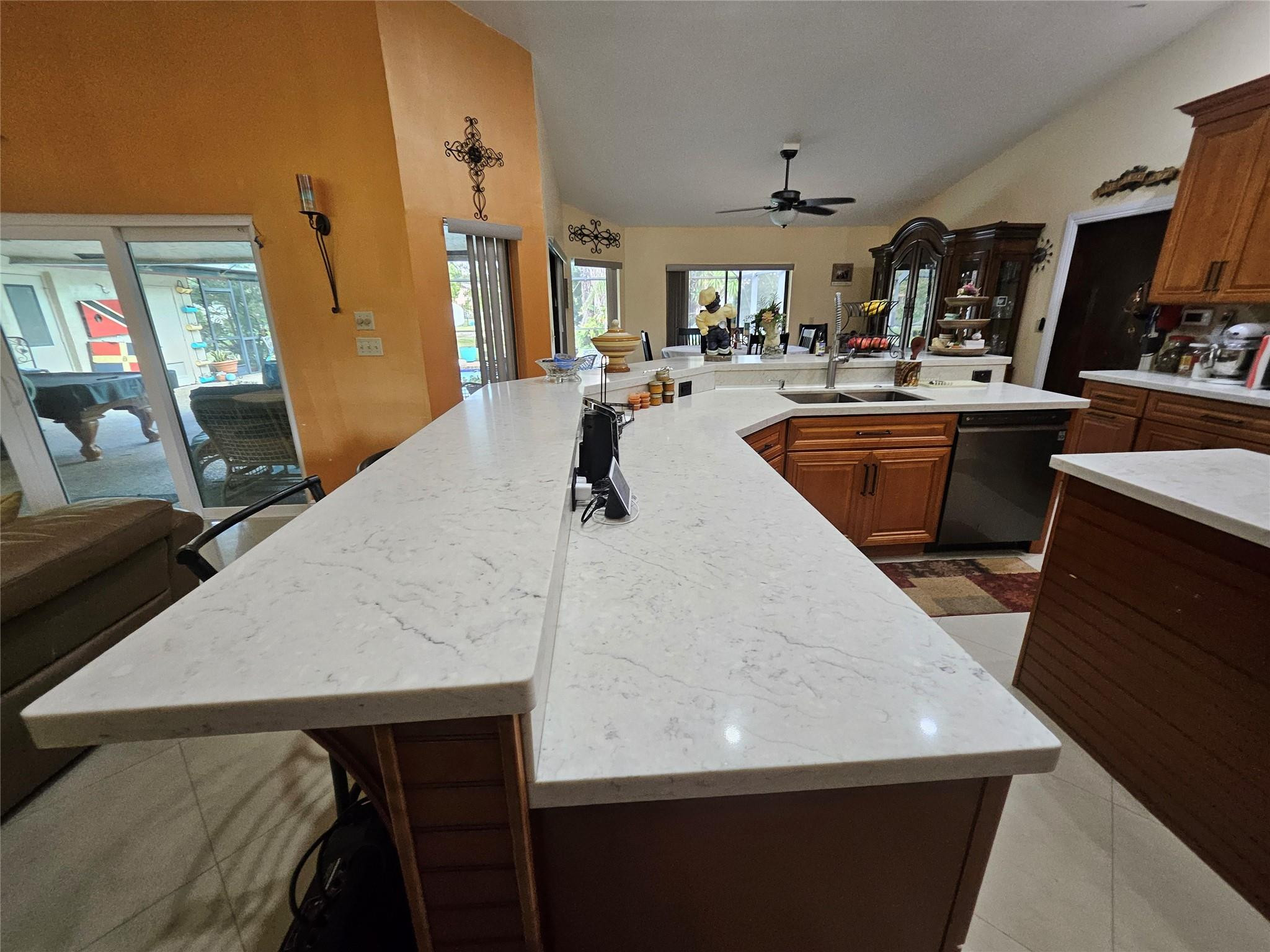No HOA, charming home, family-friendly community of Coral Springs, FL. Located in a peaceful neighborhood and cul-de-sac. See why this residence combines comfort, convenience, and Florida lifestyle appeal, nestled on an oversized waterfront lot, and luxury poolside entertainment settings. Inside, you'll find a well-designed open floor plan offering a spacious living area perfect for everyday living and entertaining. Outside, enjoy a nicely sized lot and a private yard ideal for outdoor relaxation. The home provides easy access to the best Coral Springs has to offer: excellent schools, shopping, dining, parks, and major roads for commuting. Don't miss this great opportunity to own a home in a well-sought-after location that offers the relaxed lifestyle many buyers are looking for.