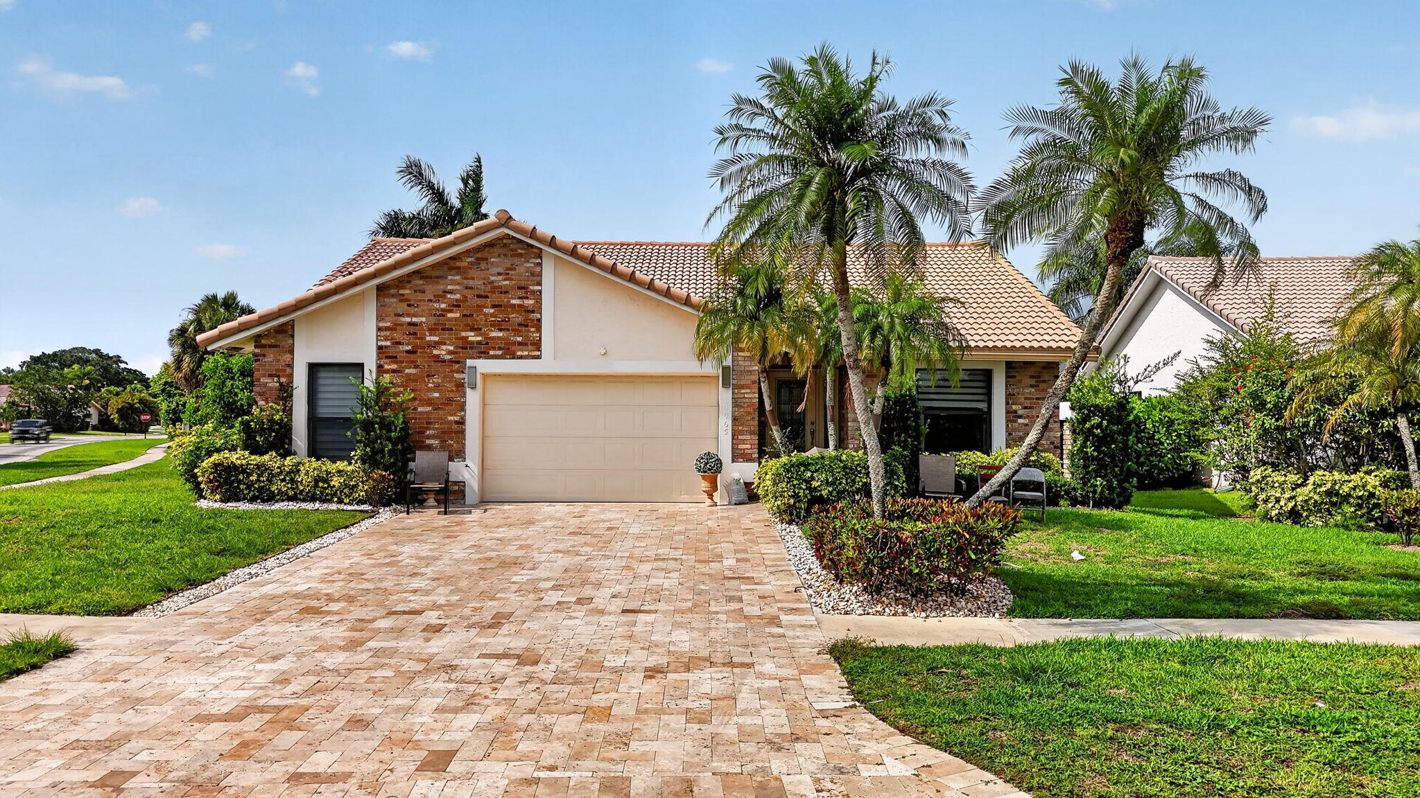 Welcome to this single-story residence in Boca Greens 5, Boca Raton, offering 2,128 square feet of finished living space with three bedrooms and two bathrooms. With upgraded kitchen and baths full impact windows and doors.This waterfront property provides a serene setting while maintaining convenient access to all that the area has to offer. The single-car garage adds practical storage and protection for your vehicle. Designed for comfortable living, this three-bedroom home delivers functional spaces ideal for modern living arrangements. The low HOA fees include cable and internet.  Walk to worship