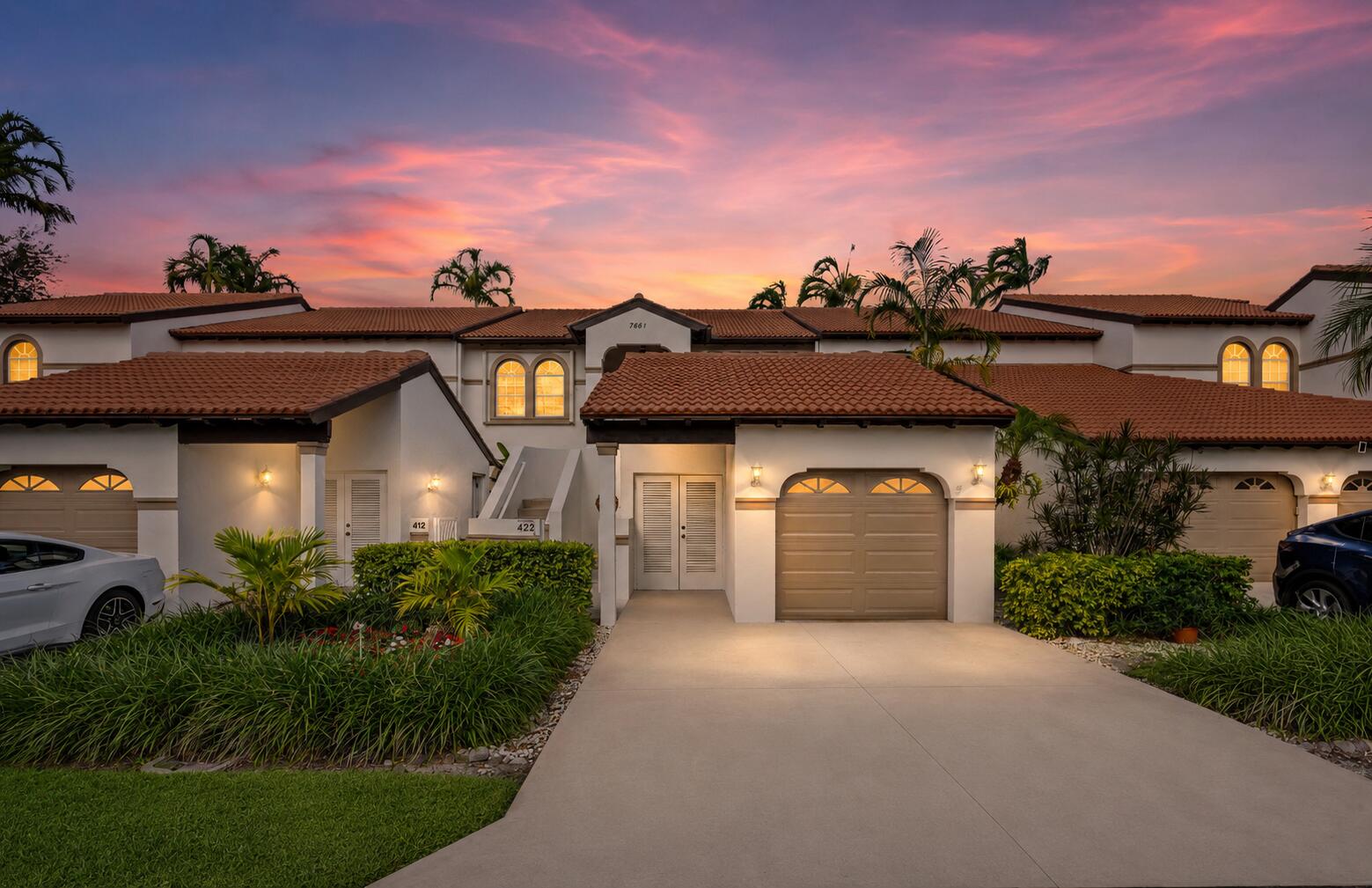 Wake up to sunrises over Palm Beach National's championship fairways at St Andrews Glen—second-floor golf course views without mandatory country club membership. This corner unit overlooks Joe Lee's 1962 design, rated among the top public courses in America by GolfAdvisor. You get the views and lifestyle without initiation fees or monthly dues. Screened lanai with impact windows, vaulted ceilings, bright eat-in kitchen with pantry, and clean original condition ready to enjoy or personalize over time. Attached garage with golf cart storage in a true cart-friendly community. Fifteen minutes to I-95, Palm Beach International Airport, downtown Lake Worth, and Lake Worth Beach. Optional membership preserves flexibility and long-term resale value. Full lifestyle and location details below. This is what smart buyers look for in Lake Worth: championship golf course views without forced country club contracts. You're not just buying a condo you're buying light, space, and a lock-and-leave lifestyle that works whether you're full-time or seasonal. Vaulted ceilings pull natural light through the open layout and toward the fairway views beyond the lanai. The kitchen sits at the center of the home with white cabinetry, pantry storage, and enough counter space for daily living without wasted square footage. Original finishes are well maintained, neutral, and functional comfortable now, flexible later.  The primary suite balances practicality and comfort with a walk-in shower for everyday use and a separate soaking tub for slower evenings. The screened lanai becomes an extension of the living space, offering changing views throughout the day from sunrise golds to evening shadows across the course. An attached one-car garage eliminates parking issues and provides room for a golf cart, bikes, and beach gear. St Andrews Glen is known for its active, social feel, where residents regularly use golf carts to visit neighbors, nearby shopping, or Palm Beach National's clubhouse and Tiki bar.  What sets this community apart is the optional membership structure. Palm Beach National delivers a relaxed golf experience music on the patio, a Toptracer driving range open until nine PM, and an approachable atmosphere without mandatory buy-ins. The option to join later preserves flexibility while protecting value, a rare advantage among Palm Beach County golf course communities.  The HOA covers exterior maintenance, landscaping, and community amenities, keeping ownership simple and predictable. Lake Worth Beach offers a central location without coastal pricing pressure. Ten minutes brings you to direct Atlantic Ocean access. Downtown Lake Worth continues to grow with destinations like Oceano Kitchen, Paradiso, Benny's on the Beach, Rustico Italiano, local breweries, galleries, and weekend festivals. Public and private investment over the past two decades has driven renewed demand as buyers recognize long-term value.  Fifteen minutes to I-95 and Palm Beach International Airport. Twenty minutes to downtown West Palm Beach and CityPlace. Twenty-five minutes to Wellington's equestrian district. Palm Beach County School District earned an A rating for the 2023-2024 school year, supporting resale strength even for buyers without school-aged children.  At this price point, most alternatives lack golf course frontage, garage parking, or optional membership flexibility. Second-floor fairway views with an attached garage consistently outperform interior units over time. This is a position that holds.  Esta propiedad ofrece vistas directas al campo de golf Palm Beach National sin la obligación de membresía. Ubicada en el segundo piso y en esquina, permite disfrutar de amaneceres sobre el diseño original de Joe Lee de 1962, reconocido a nivel nacional. La distribución abierta con techos altos maximiza la luz natural y conecta los espacios principales con el lanai con malla e impacto.  La cocina tipo comedor cuenta con gabinetes blancos, despensa y acabados originales bien conservados, funcionales para uso inmediato o actualización futura. La suite principal combina ducha amplia y bañera independiente, ofreciendo comodidad diaria sin necesidad de remodelaciones inmediatas. El garaje privado facilita estacionamiento seguro y almacenamiento adicional para carrito de golf, bicicletas o equipo de playa.  St Andrews Glen es una comunidad activa y organizada para el uso de carritos de golf. La membresía del club es opcional, lo que permite mantener flexibilidad financiera mientras se conserva el atractivo a largo plazo. La asociación cubre mantenimiento exterior y áreas comunes, simplificando la propiedad.  Lake Worth Beach se encuentra a diez minutos del océano Atlántico y ofrece acceso conveniente a restaurantes, centros culturales y rutas principales. La cercanía a la I-95, al Aeropuerto Internacional de Palm Beach y al centro de West Palm Beach posiciona esta propiedad como una opción sólida tanto para residencia como inversión.
