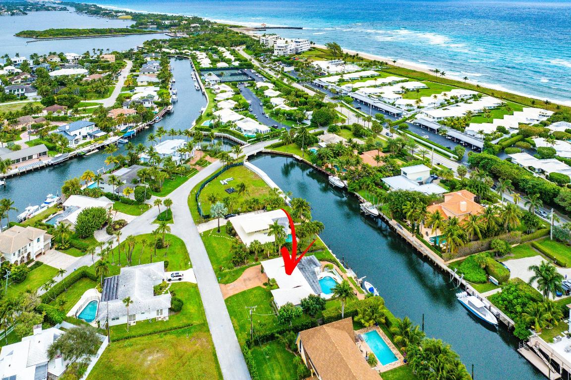 Rare Waterfront Opportunity in Ocean Ridge - 100 Feet of Deep-Water Frontage. An extraordinary opportunity to own a premier waterfront property on the highly coveted Sabal Island in Ocean Ridge, Florida. This quarter-acre estate boasts 100 feet of true deep-water frontage, offering direct access to one of the finest waterways in the area—perfect for boating enthusiasts and those seeking the ultimate coastal lifestyle. The existing residence offers 2 bedrooms, 2 baths, a den, a two-car garage across approximately 2,500 square feet—an excellent opportunity to renovate, reimagine, or create your custom dream home. Whether you choose to transform the current home or start fresh, the value lies in the land, the water frontage, and the unmatched location. Ocean Ridge is one of South Florida's best-kept secrets. The charming coastal town is known for its beauty, tranquility, and exceptional sense of privacy and security. With no commercial congestion and a strong residential character, Ocean Ridge offers a peaceful seaside lifestyle while remaining centrally located between Palm Beach and Delray Beach. Enjoy quick access to Atlantic Avenue in Delray Beach, renowned for its dining, shopping, and nightlife, or head north to Palm Beach's Worth  Avenue, 25 minutes away. 

This property also includes membership to the exclusive McCormick Beach Club, providing private beach accessan invaluable amenity that completes the ultimate Florida waterfront lifestyle.

Ocean Ridge represents one of the best value price points in all of South Florida for waterfront living. With limited inventory, protected waterways, and a highly desirable location, opportunities like this are increasingly rare.
Dream home. Dream location. Exceptional value.

A truly special offering in one of South Florida's most beautiful and sought-after coastal communities.