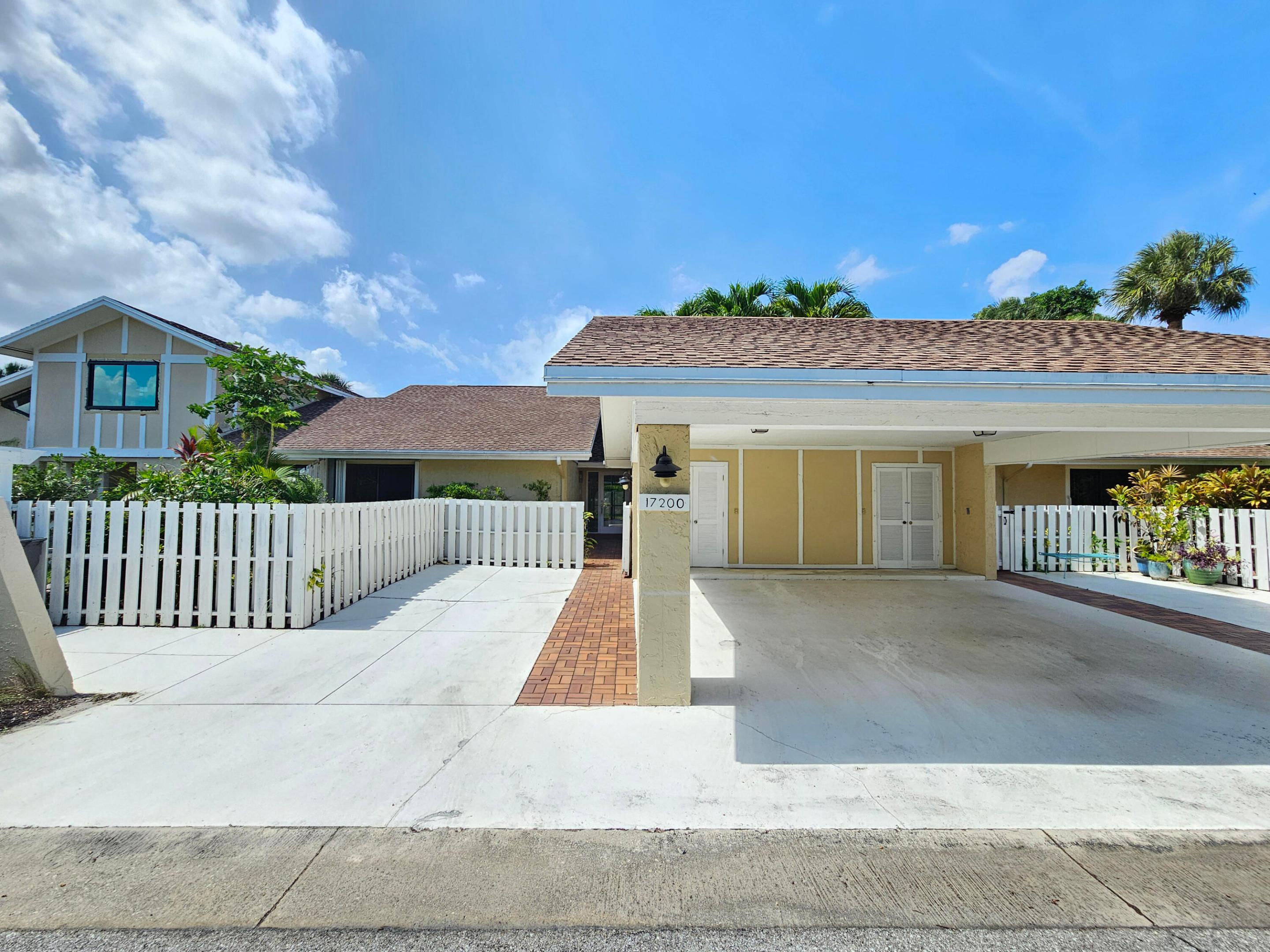 Come see this wonderful 2 bedroom / 2 bathroom villa with a carport in the exquisite gated community of Jonathan's Landing. As you enter, you will notice the fresh paint, neutral tile and vaulted ceilings. The kitchen has stainless appliances, granite counters, and plenty of cabinet space. Both bedrooms are spacious and feature en suite bathrooms. The patio is perfect for sipping your morning coffee or reading a book. Brand new water heater just installed. Optional golf and tennis memberships are available, but not mandatory. Jonathan's Landing is a premier residential golf and boating community within a pristine natural setting just minutes away from the Atlantic Ocean. With many amenities and social events throughout the year, what more could you ask for? This HomePath deal won't last! ***Some photos have been virtually staged***