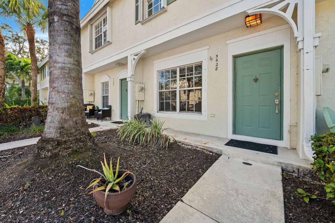 Seize this rare opportunity to own a beautifully renovated townhouse in a highly desirable location zoned for A-RATED COUNTRY HILLS ELEMENTARY, CORAL SPRINGS MIDDLE, AND MARJORY STONEMAN DOUGLAS HIGH SCHOOL. This home is a true standout in the gated CORAL REEF CLUB and features EXTREMELY LOW TAXES, thousands less than other homes within same community. No details were spared in its high-end transformation, including the removal of all popcorn ceilings for a sleek, modern finish. The interior features stunning real wood flooring throughout, offering timeless elegance and warmth. The bathrooms have been tastefully updated with new vanities and modern glass bowl sinks. Both bedrooms feature adjustable closets for maximized storage. The layout is complemented by a versatile loft that serves as the perfect bonus space for a home office or playroom. This unit is situated in a prime location within the community, allowing for a private backyard with no neighbors opposite you. Looking out from your large screened-in patio, which includes a separate storage closet, you are met with a serene and tree-lined view. This location offers effortless access to the SAWGRASS EXPRESSWAY, making for a convenient and easy commute. Residents enjoy fantastic community amenities including a pool, playground, and basketball court. Take advantage of this amazing opportunity to make this your perfect home in a great location.