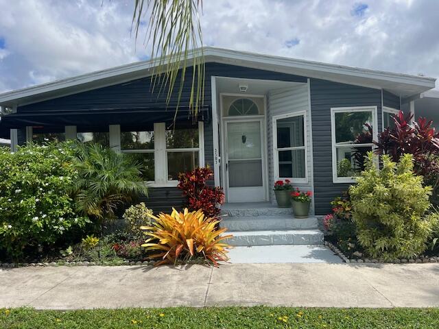 Beautiful manufactured home in a gated 55+ community . Own your home for only $1,053/month without the land. Enjoy peaceful walks, a community pool with gorgeous water views, and a quiet lifestyle. Club house . This corner-lot home features some renovations, stainless steel appliances, and a newer screened patio. A great opportunity to enjoy comfort, convenience, and affordability. HVAC 2023 WATER HEATER 2018  The Land  lease FEE is included in the monthly HOA payment .