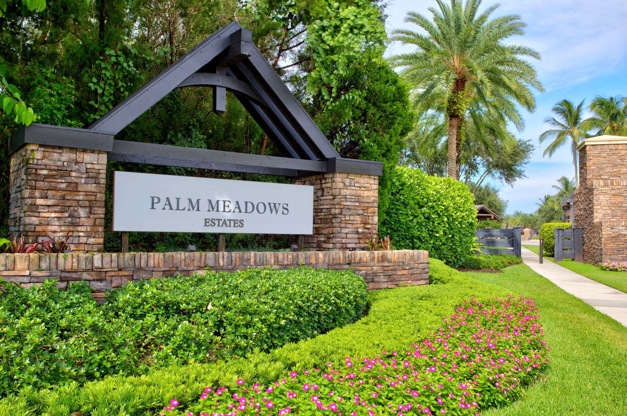 Welcome to luxury living in the prestigious, gated enclave of Palm Meadows Estates. This stunning "Provence" model features 4 spacious bedrooms plus office/den and 4.5 bathrooms, and over 3,312 square feet of beautifully designed, light-filled living space, perfectly situated on a premium corner lot with sweeping lake views.  Step out back into your own private paradise, complete with a sparkling custom pool positioned for ideal southern exposure—ensuring gorgeous, natural Florida sunshine all day long.  Natural Gas Fire-Pit for evenings with friends and family making s'mores and enjoying the Sunset.  Built with meticulous attention to detail, this CBS-construction home offers peace of mind with full hurricane-impact glass windows and solid doors.   Sellers didn't skip a detail when it came to the upgrades. A wrought iron and wood staircase with an Office Den at the entry to the property and that second, first floor bedroom and full bath allows for multigenerational living   The open-concept layout boasts soaring volume ceilings, a modern gourmet kitchen with Gas Cooking direct to the property.   This gourmet kitchen with ample space for a large family and entertaining friends that flows to the main living area and the outdoor oasis.  Also on the first-floor is the  primary bedroom suite acting as your private sanctuary.  Residents of Palm Meadows enjoy world-class resort-style amenities, Just steps from the property including a luxury clubhouse, state-of-the-art fitness center, resort pool, and sports courts, pickleball and tennis. Perfectly located in Boynton Beach with easy access to fine dining, shopping, and pristine area beaches. Schedule your private tour today!