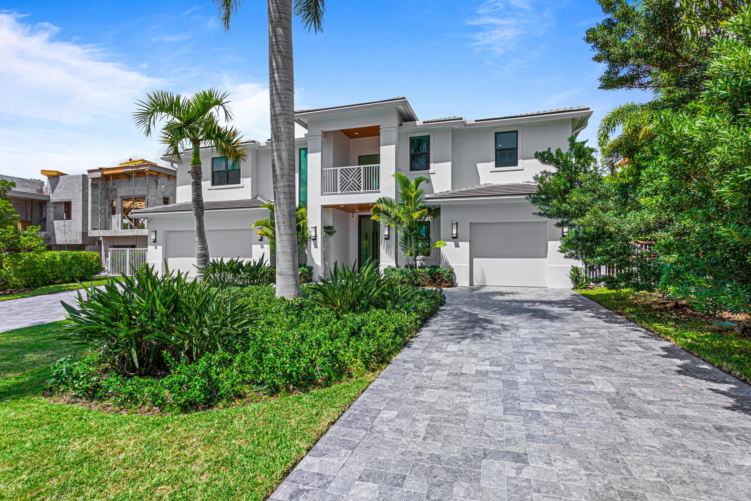 New Chic Coastal estate sited in East Boca Raton 33432. An impressive two-story foyer leads to the open floor plan with sleek porcelain floors throughout the main level. A gourmet island kitchen features designer cabinetry with Wolf and Sub-Zero appliances overlooking the sparkling pool, Club room and guest bedroom suite. The second level boasts a loft and separate office, Primary Suite with spa-like bath, two outfitted wardrobes and balcony. Three additional bedrooms suites accommodate family and guests. Resort-like pool with expansive lanai with summer kitchen and cabana. Other amenities include two utility rooms, wine display and 3 bay garage. Shown by appt only. DISCLAIMER: Information published or otherwise provided by the listing company and its representatives including but not limited to prices, measurements, square footages, lot sizes, calculations, statistics, and videos are deemed reliable but are not guaranteed and are subject to errors, omissions or changes without notice. All such information should be independently verified by any prospective purchaser or seller. Parties should perform their own due diligence to verify such information prior to a sale or listing. Listing company expressly disclaims any warranty or representation regarding such information. Prices published are either list price, sold price, and/or last asking price. The listing company participates in the Multiple Listing Service and IDX. The properties published as listed and sold are not necessarily exclusive to listing company and may be listed or have sold with other members of the Multiple Listing Service. Transactions where listing company represented both buyers and sellers are calculated as two sales. The listing company's marketplace is all of the following: Vero Beach, Town of Orchid, Indian River Shores, Town of Palm Beach, West Palm Beach, Manalapan Beach, Point Manalapan, Hypoluxo Island, Ocean Ridge, Gulf Stream, Delray Beach, Highland Beach, Boca Raton, East Deerfield Beach, Hillsboro Beach, Hillsboro Shores, East Pompano Beach, Lighthouse Point, Sea Ranch Lakes and Fort Lauderdale. Cooperating brokers are advised that in the event of a Buyer default, no financial fees will be paid to a cooperating Broker on the Deposits retained by the Seller. No financial fees will be paid to any cooperating broker until title passes or upon actual commencement of a lease. Some affiliations may not be applicable to certain geographic areas. If your property is currently listed with another broker, please disregard any solicitation for services. Copyright 2023 by the listing company. All Rights Reserved.