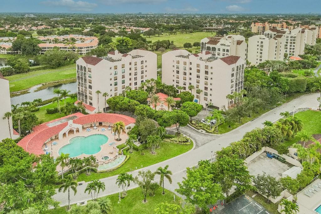 Magnificent luxury home located in the middle of the tropical paradise. The exclusive features are as follows, total square feet is 3156, living sq feet 2655 including 3 bedrooms 2.5 bathrooms. Located on the 7th floor with lots of privacy, only 2 units per floor. Prestigious country club. Total ultra modern remodeled home with crown molding. Wrap around the balcony with hurricane shutters and impact windows. Beige porcelain tile throughout the home. All stainless steel appliances.  New 3 ton and 2.5 ton air conditioning systems. Ultra modern design LED lighting.  Three attached wall mounted smart flat screen TVs. Flexible/optional membership programs. All resort style amenities. Must see in person to fully appreciate all the amazing details of the home.