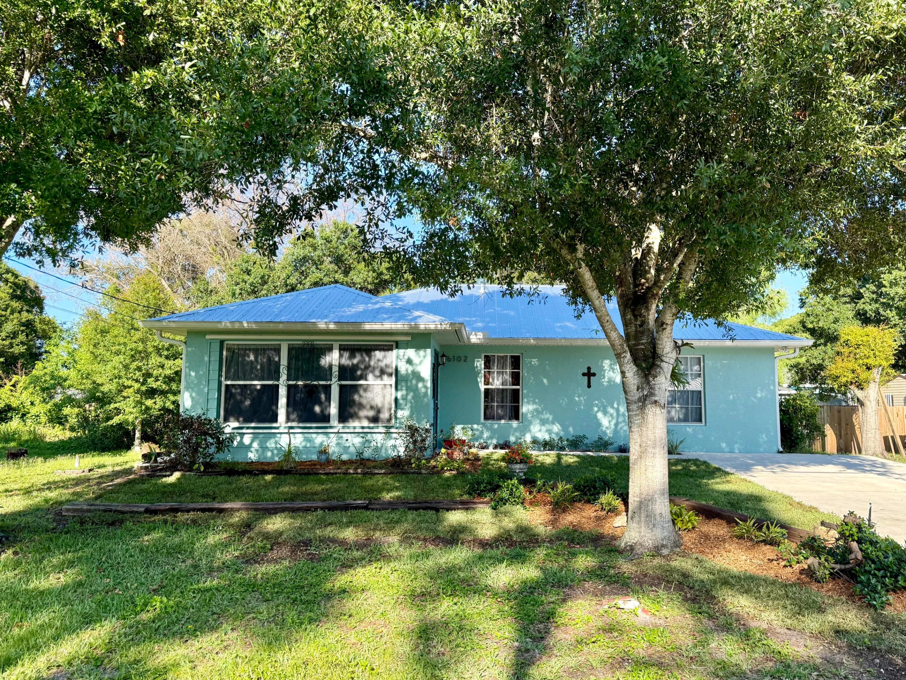 Located in desirable Indian River Estates, this well-maintained 3-bedroom, 1-bath CBS home offers durability, convenience, and value. Built in 2008, the property features a brand-new 2026 metal roof. Connected to city water, with an additional well already on site that can be utilized for an irrigation system installation. The property includes three sheds (the 14x20 shed has power and A/C already installed) providing ample storage for tools, equipment, hobbies, or workspace needs. Centrally located just minutes from shopping, restaurants, schools, and the area's beautiful beaches, this home offers both comfort and accessibility. Whether you're looking for a primary residence, seasonal home, or investment opportunity, this property is move-in ready and packed with potential.