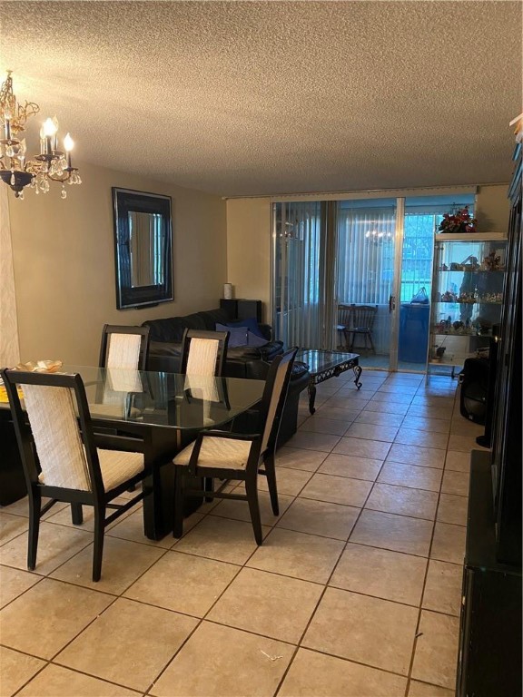 Cozy 2 bed 2 bath condo on 1st floor in well maintained 55+ complex (HOPA). Unit has tile flooring throughout. New electric panel installed & cold A/C for those hot summer months. Large master bedroom with walk-in closet. Enclosed patio with lovely view of the garden, pool and club house with on-site manager. Centrally and conveniently located within walking distance to the bus stop, hospital and bank. Short drive to Publix, Aldi, Ross, Burlington, and many other conveniences.  Fort Lauderdale Beach is a 15 min. drive. Hollywood International Airport is approx. 25 minutes. Assigned parking & elevator building with community laundry available on every floor.  Occupancy guidelines: 1 person must be 55 yrs and over and the other over 15 yrs.