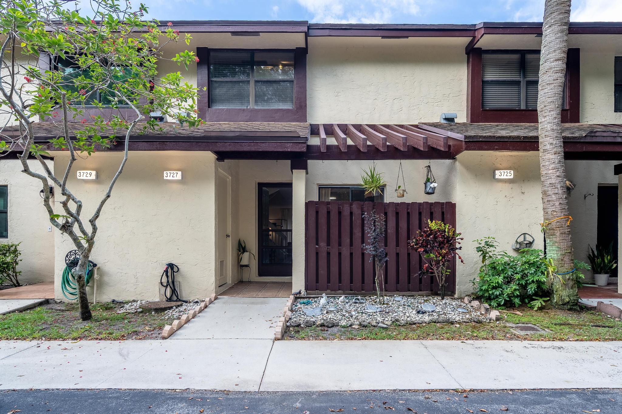Welcome to this charming two-story Fee Simple townhouse in Golden Raintree at the Township in Coconut Creek. This waterfront property offers 1,480 square feet of finished living space across two floors, with two spacious bedrooms, each with its own en-suite bathroom, plus a half bath downstairs. The thoughtful layout provides comfortable accommodations and practical living. Updated kitchen and bathrooms. Open patio backing to a serene pond. Township offers resort-style amenities, and it is conveniently located near shopping, dining, and recreational facilities. Ideally located just about a mile from The Promenade at Coconut Creek, Butterfly World, and Tradewinds Park.